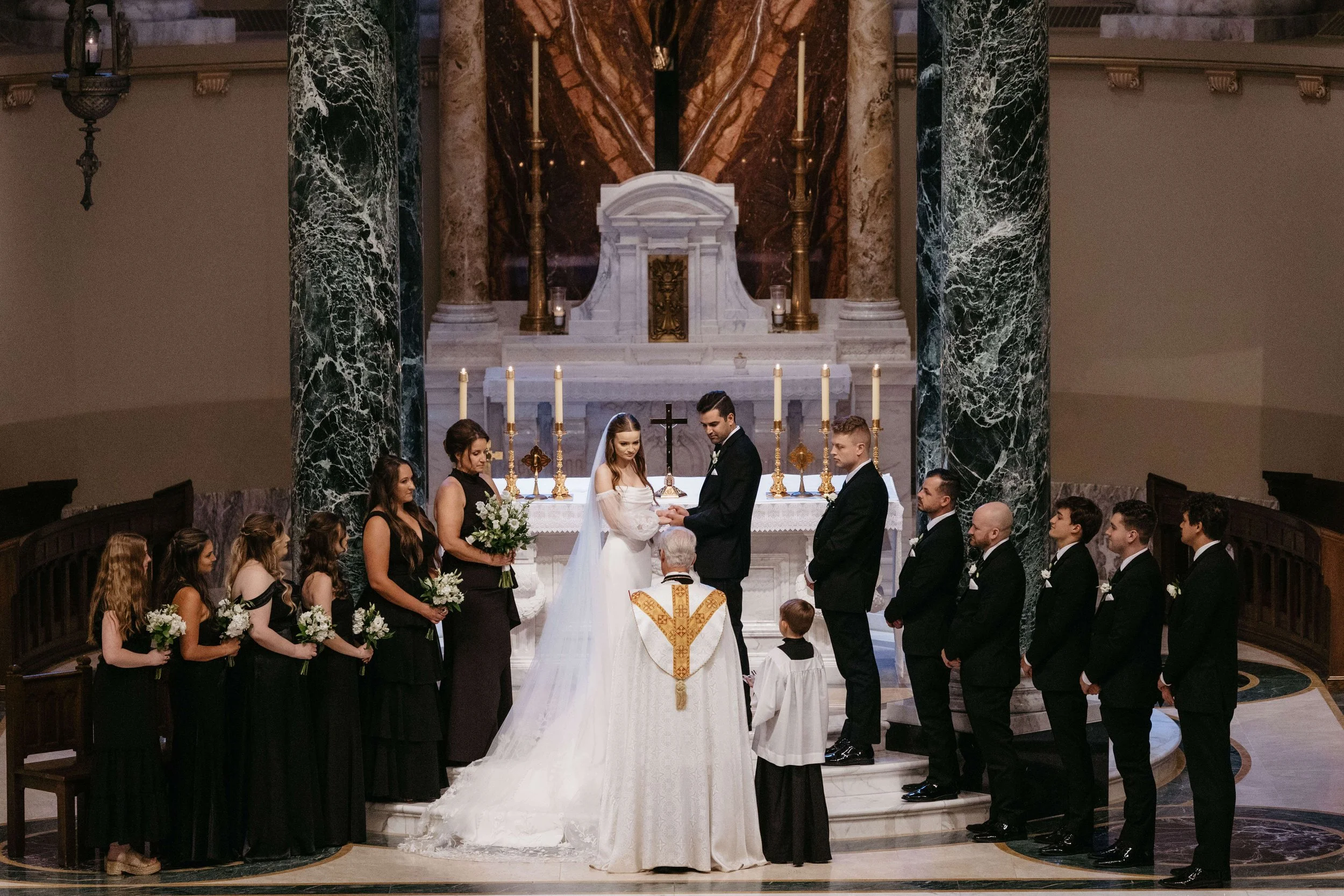 Couple during their Ceremony at historic St. Josephs Cathedral in downtown Sioux Falls.