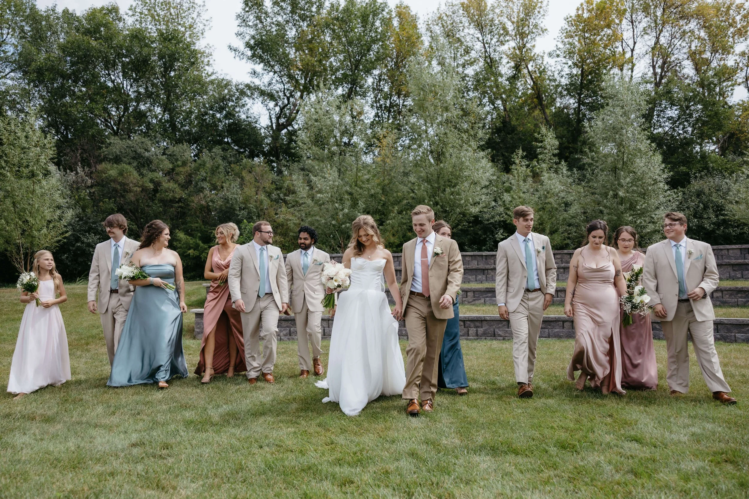 Bride and groom doing wedding portraits at The Atrium in Sioux Falls. Photographed by Jenna Heckel Photography.