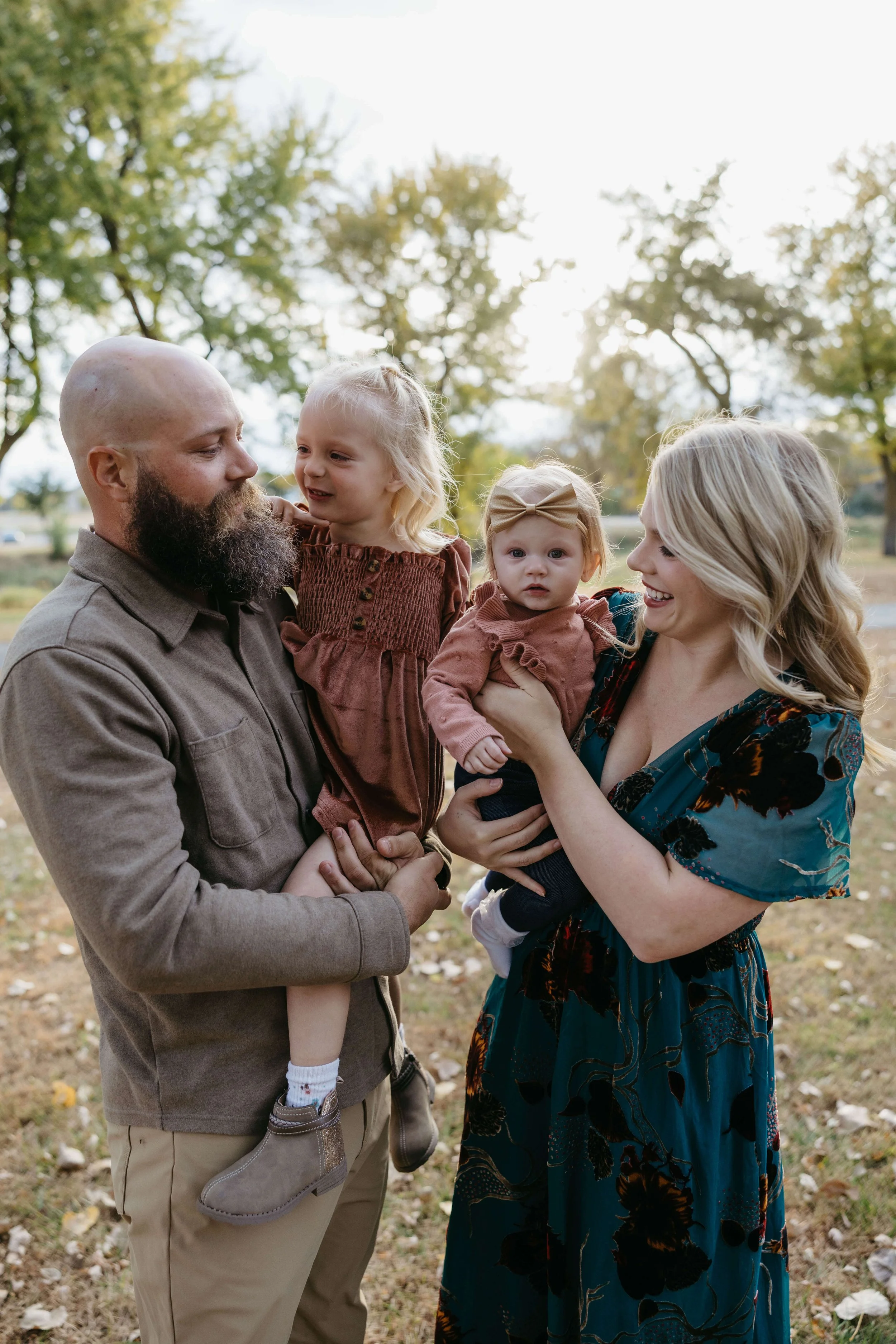 Family photo session at Rotary park in Sioux Falls, SD during family photoshoot with family photographer Jenna Heckel Photography.