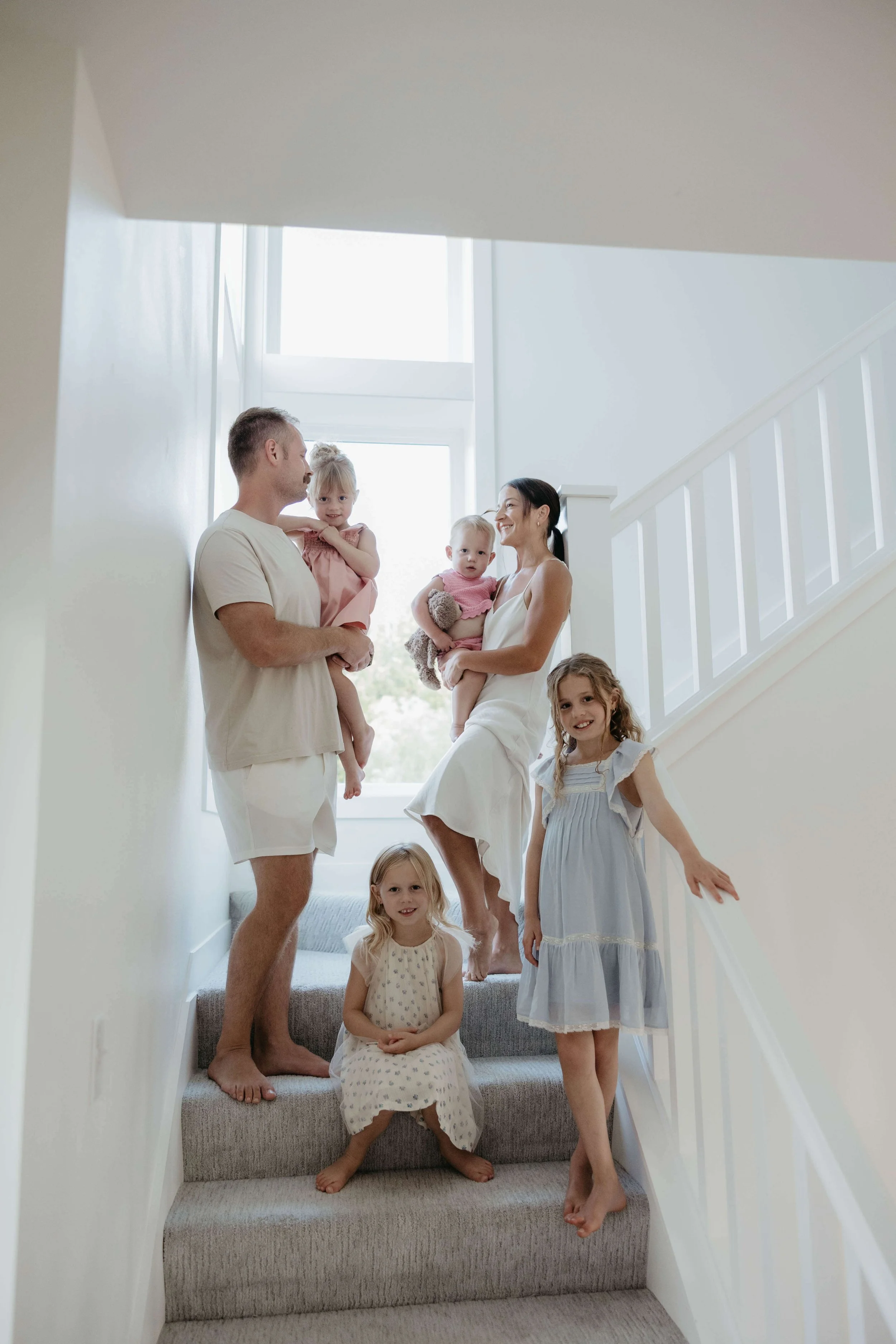 In home family portraits at family's home near Brandon South Dakota. Photographed by Jenna Heckel Photography.