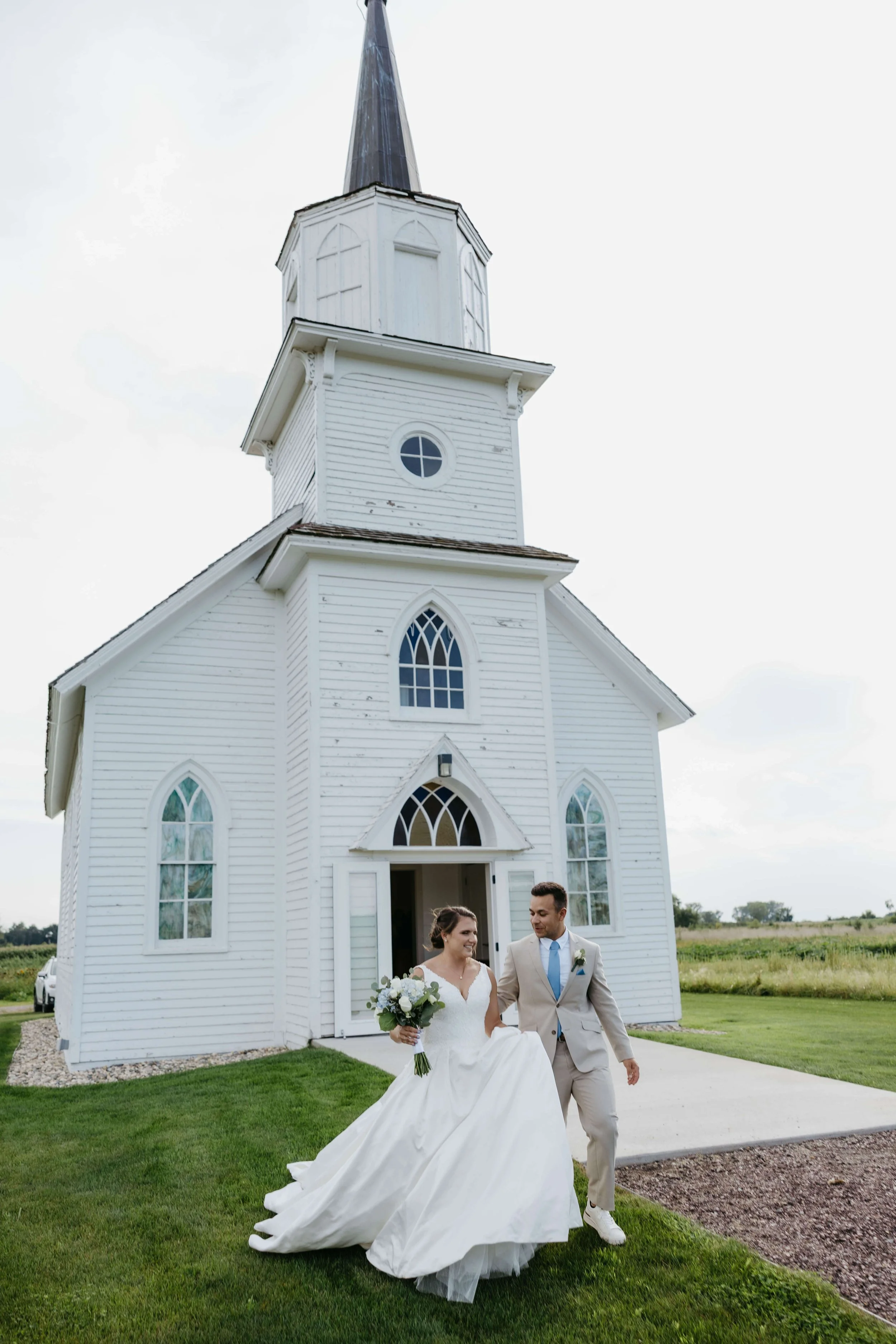 Bride and groom at their micro wedding at the Beaver Creek Chapel in Harrisburg South Dakota.