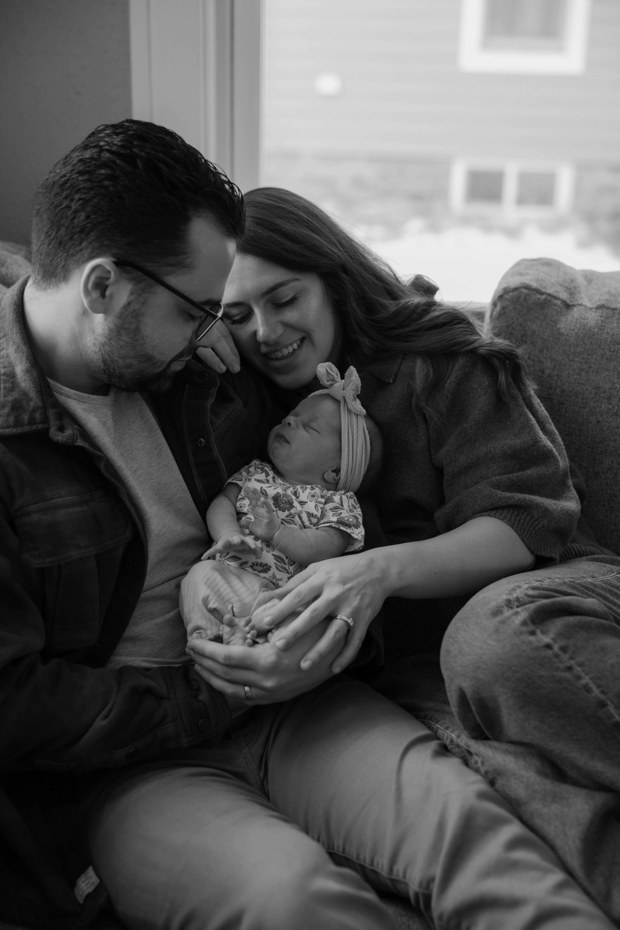 In home lifestyle newborn family photos in downtown Sioux Falls.