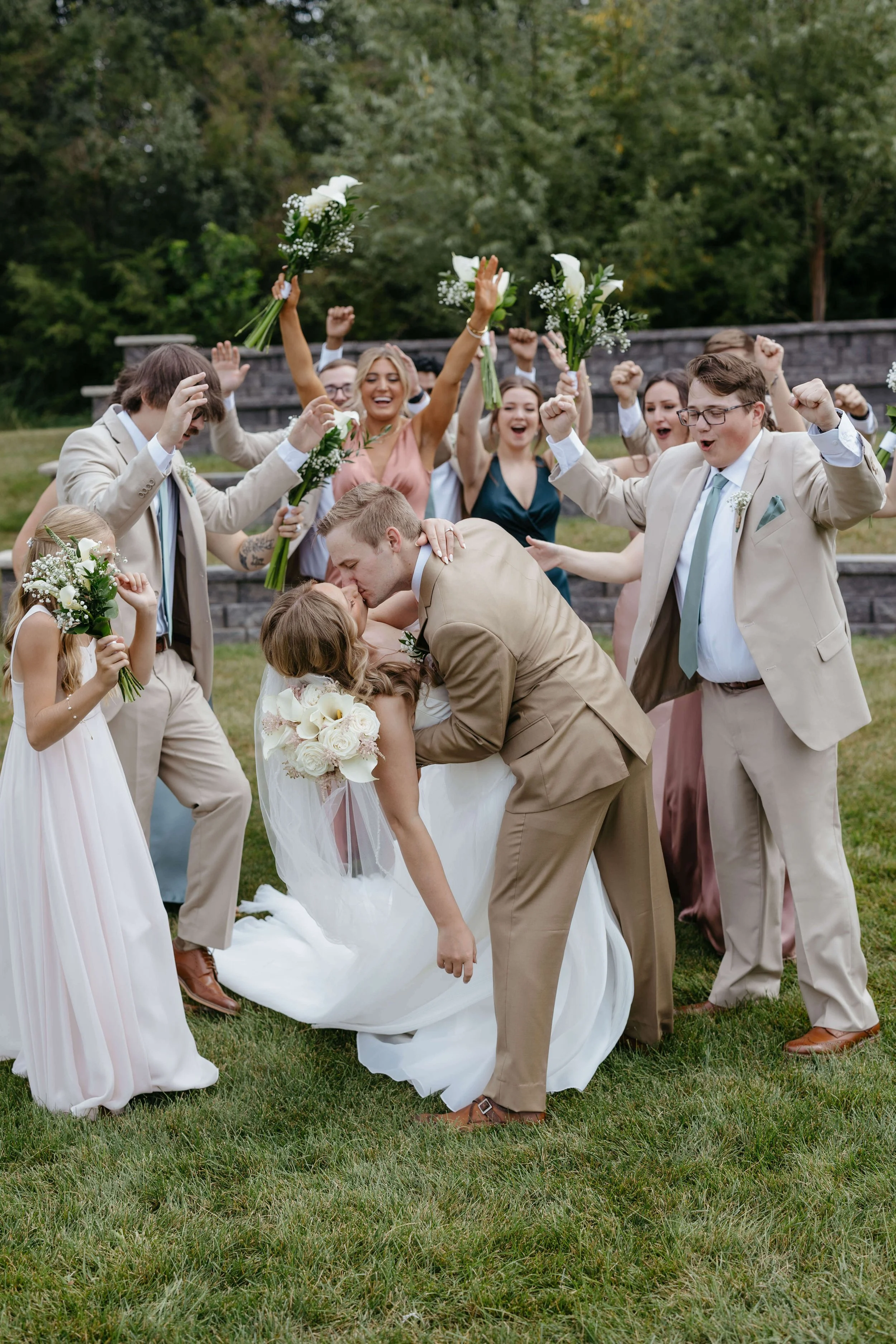 Bride and groom doing wedding portraits at The Atrium in Sioux Falls. Photographed by Jenna Heckel Photography.