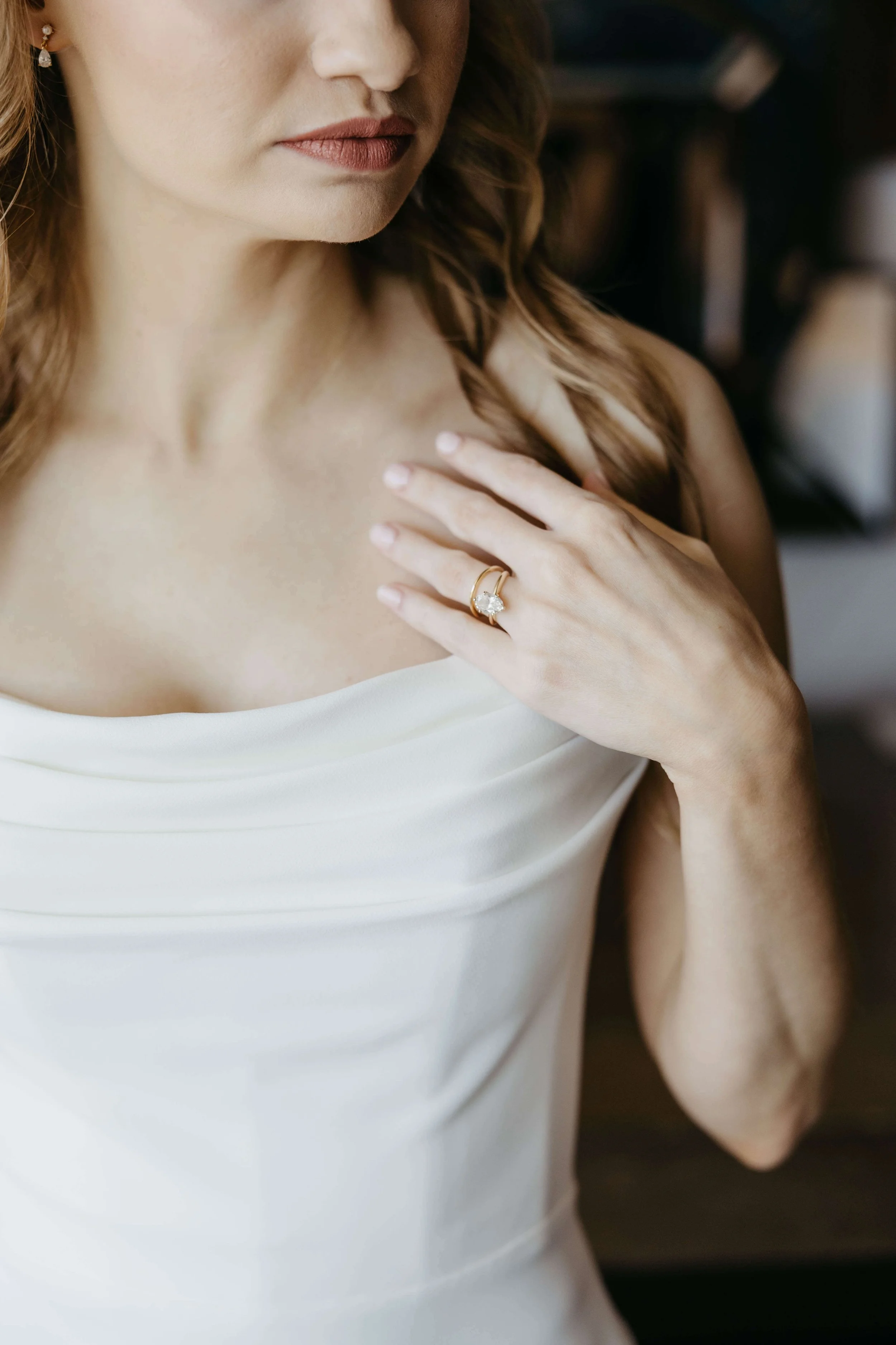 Bride getting ready in downtown Sioux Falls South Dakota on her wedding day. Photos shot by Jenna Heckel Photography.