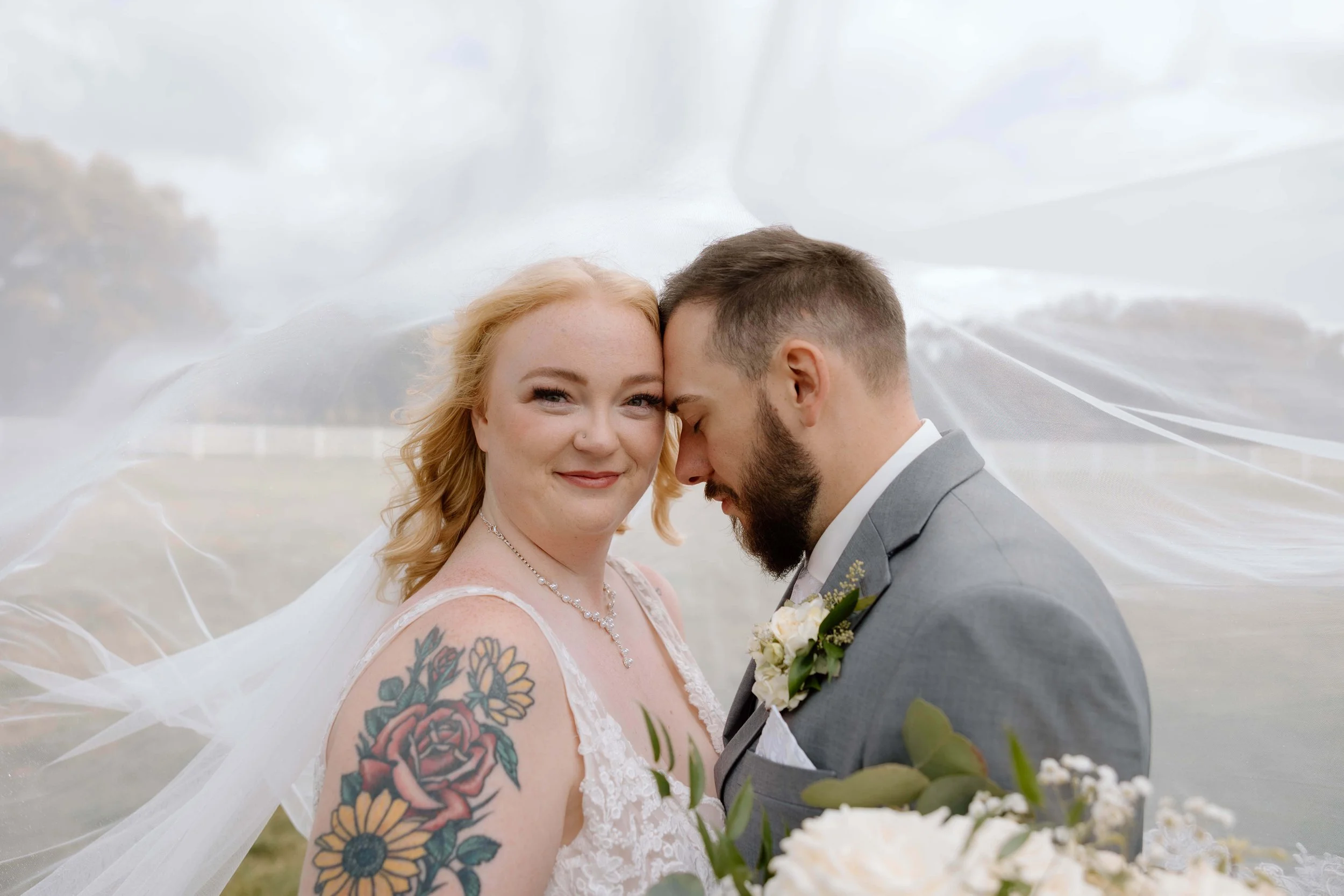 Bride and groom at Laural Ridge Barn in Sioux Falls, South Dakota. Photographed by Jenna Heckel Photography. 
