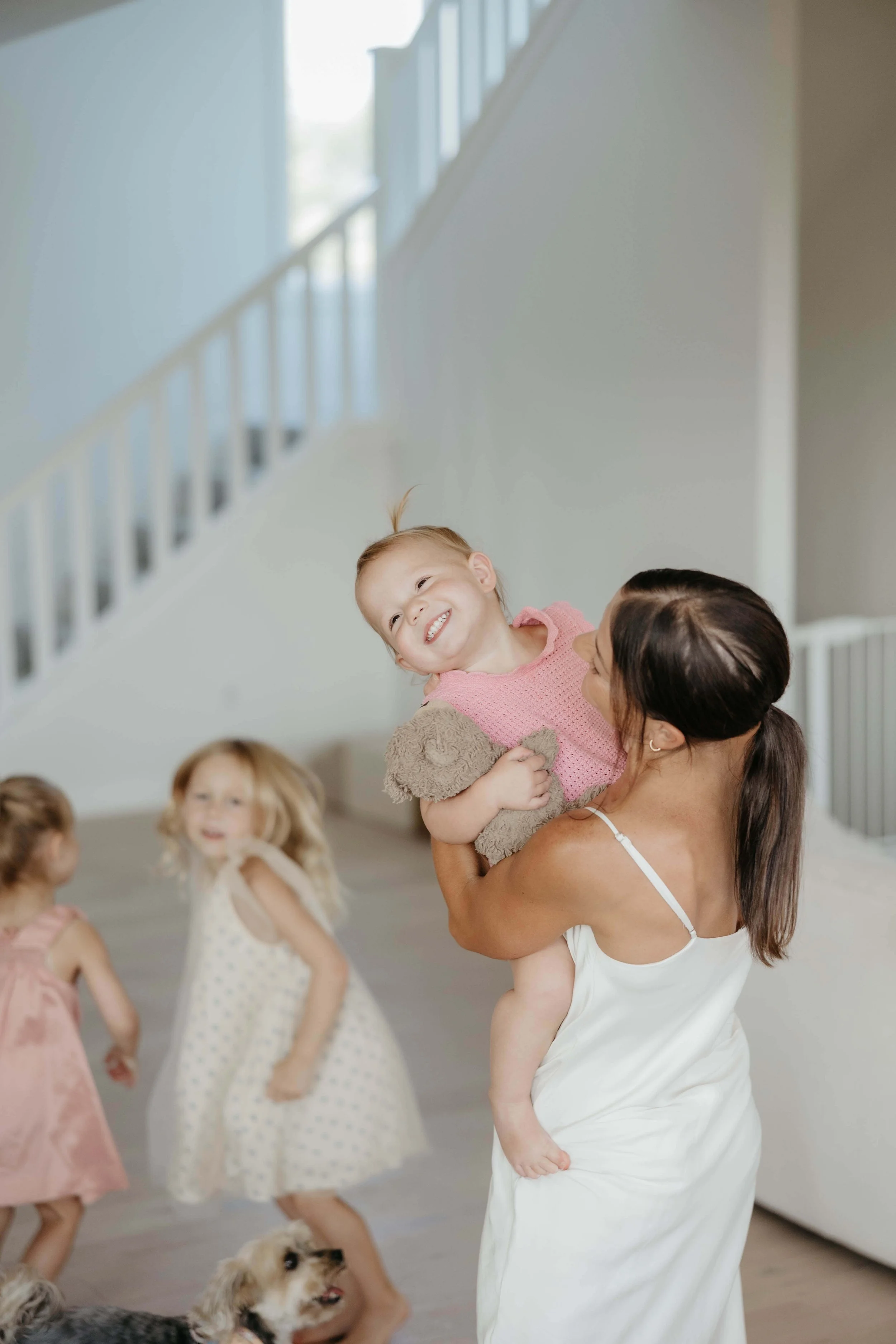 In home family portraits at family's home near Brandon South Dakota. Photographed by Jenna Heckel Photography.