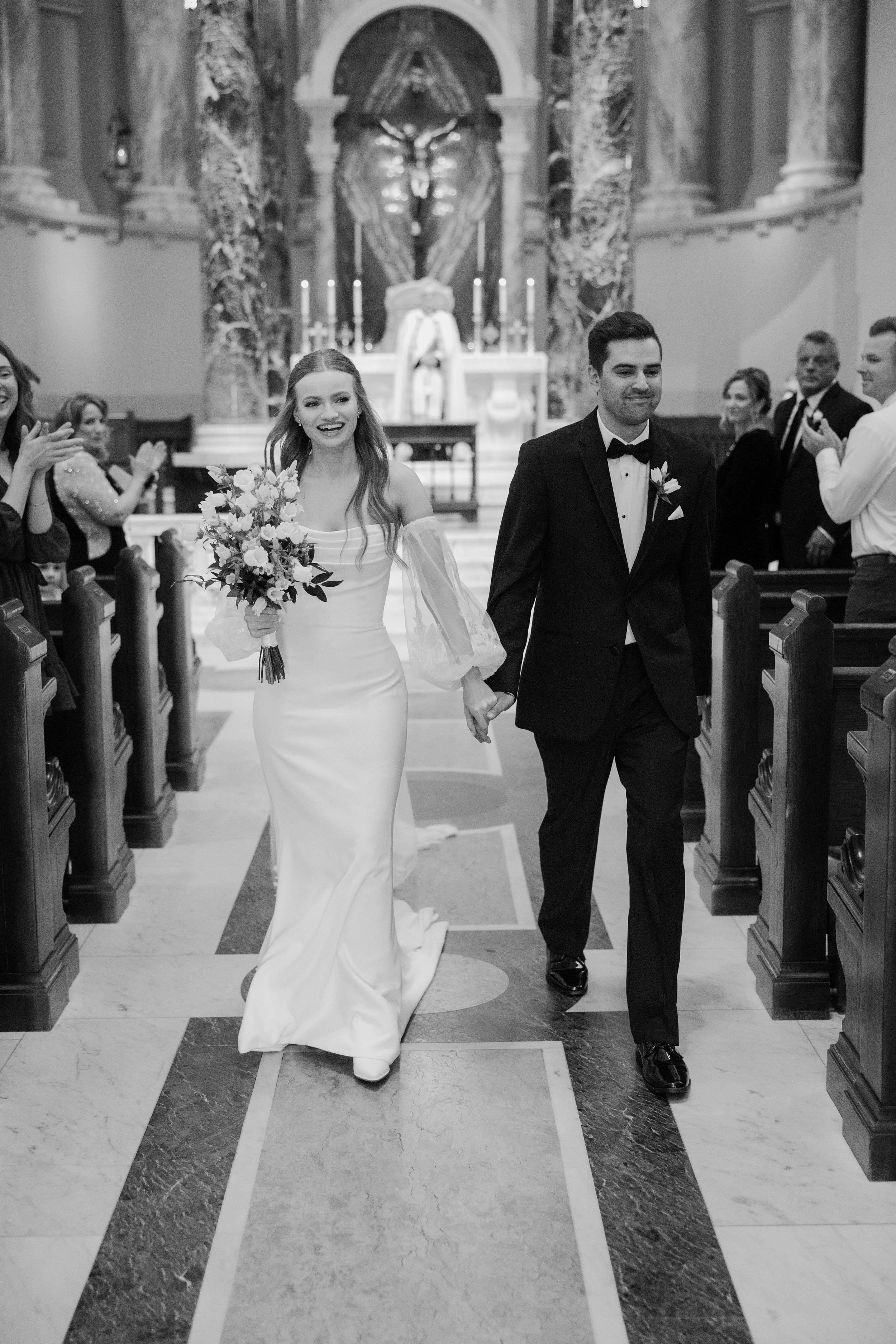 Couple during their Ceremony at historic St. Josephs Cathedral in downtown Sioux Falls.