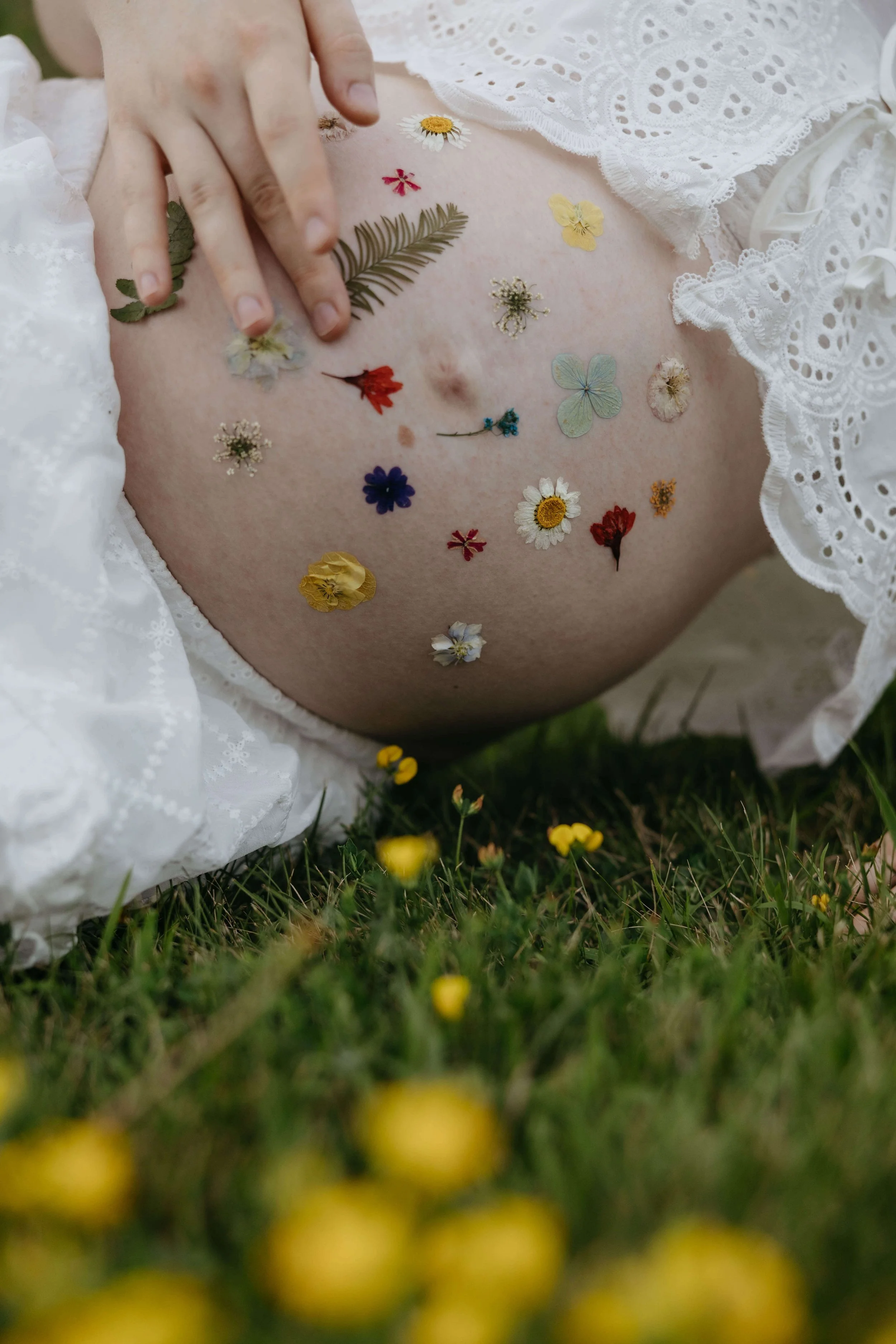 Mother doing maternity photos at Mary Jo Wegner near Sioux Falls, South Dakota. Photographed by Jenna Heckel Photography.