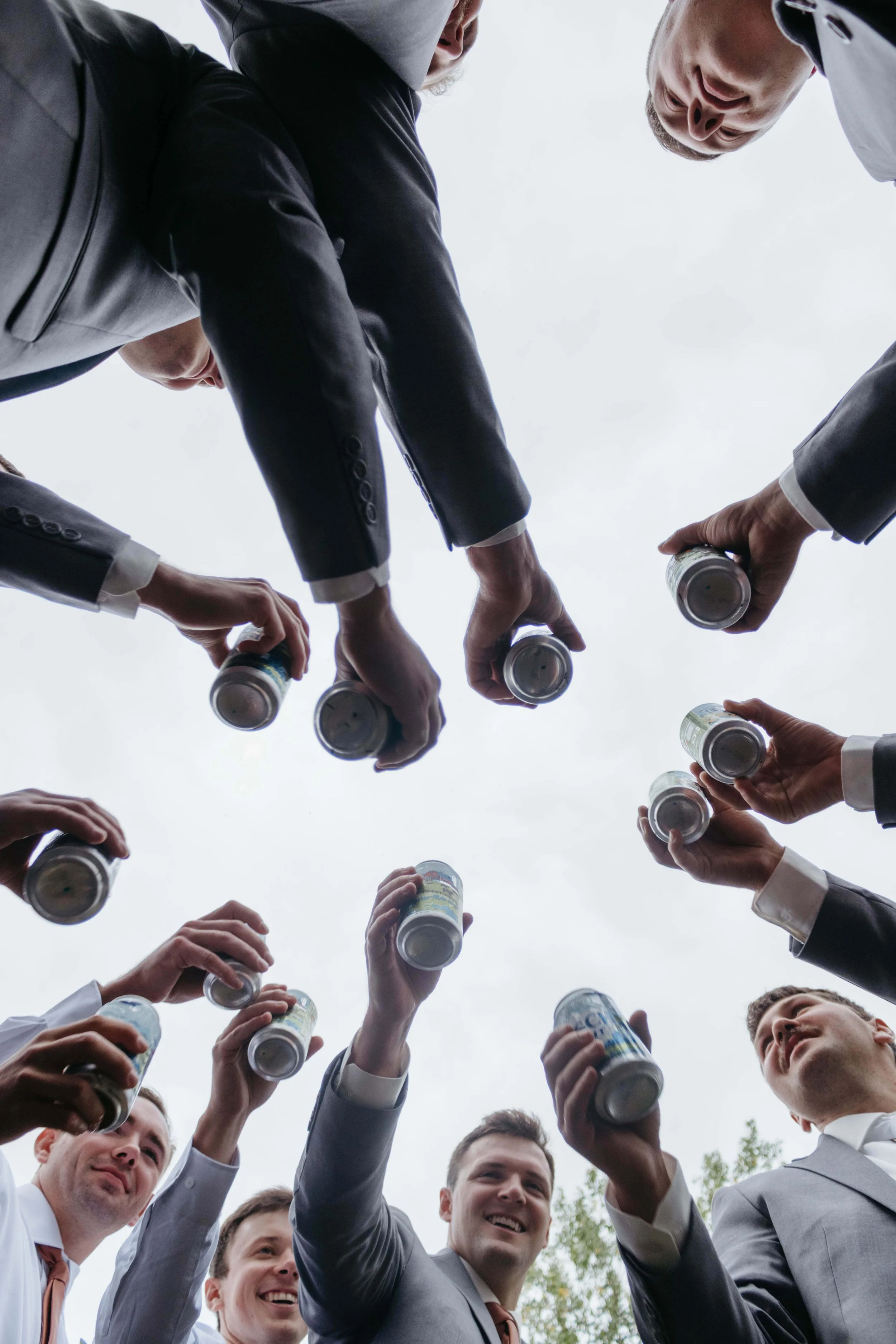 Wedding party doing fun photos near Bersford South Dakota at fall wedding. Photographed by Jenna Heckel Photography. 