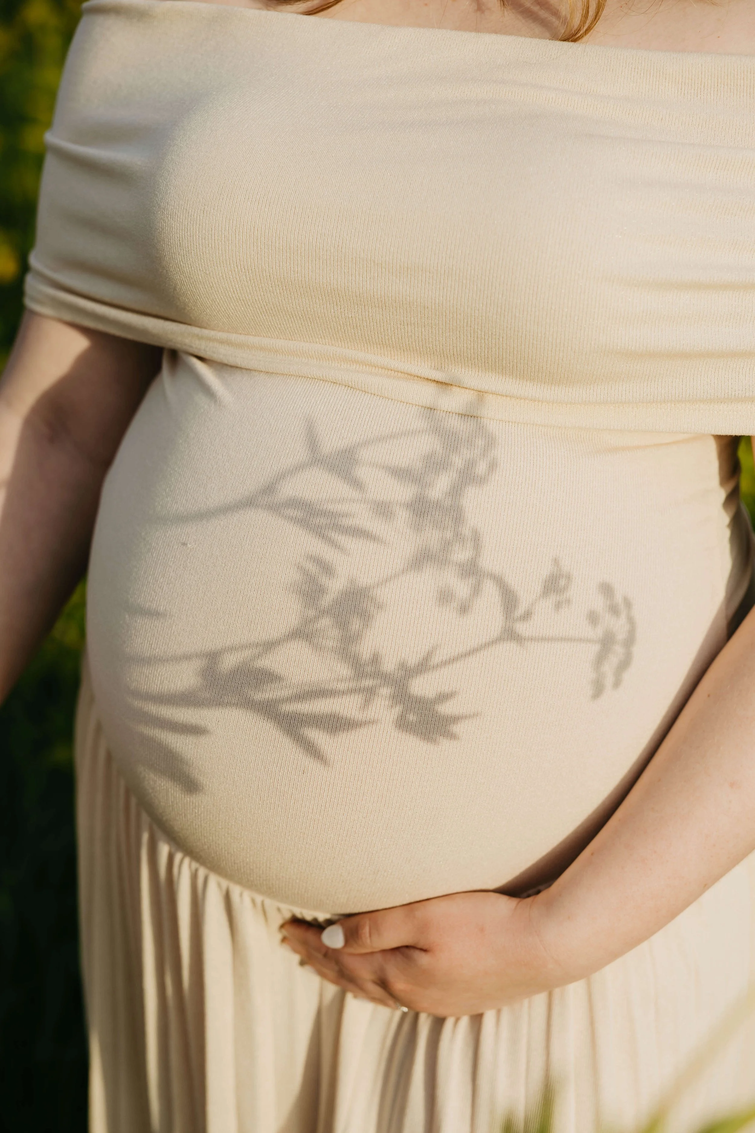 Maternity photos at Good Earth State Park near Sioux Falls, South Dakota. Photographed by Jenna Heckel.