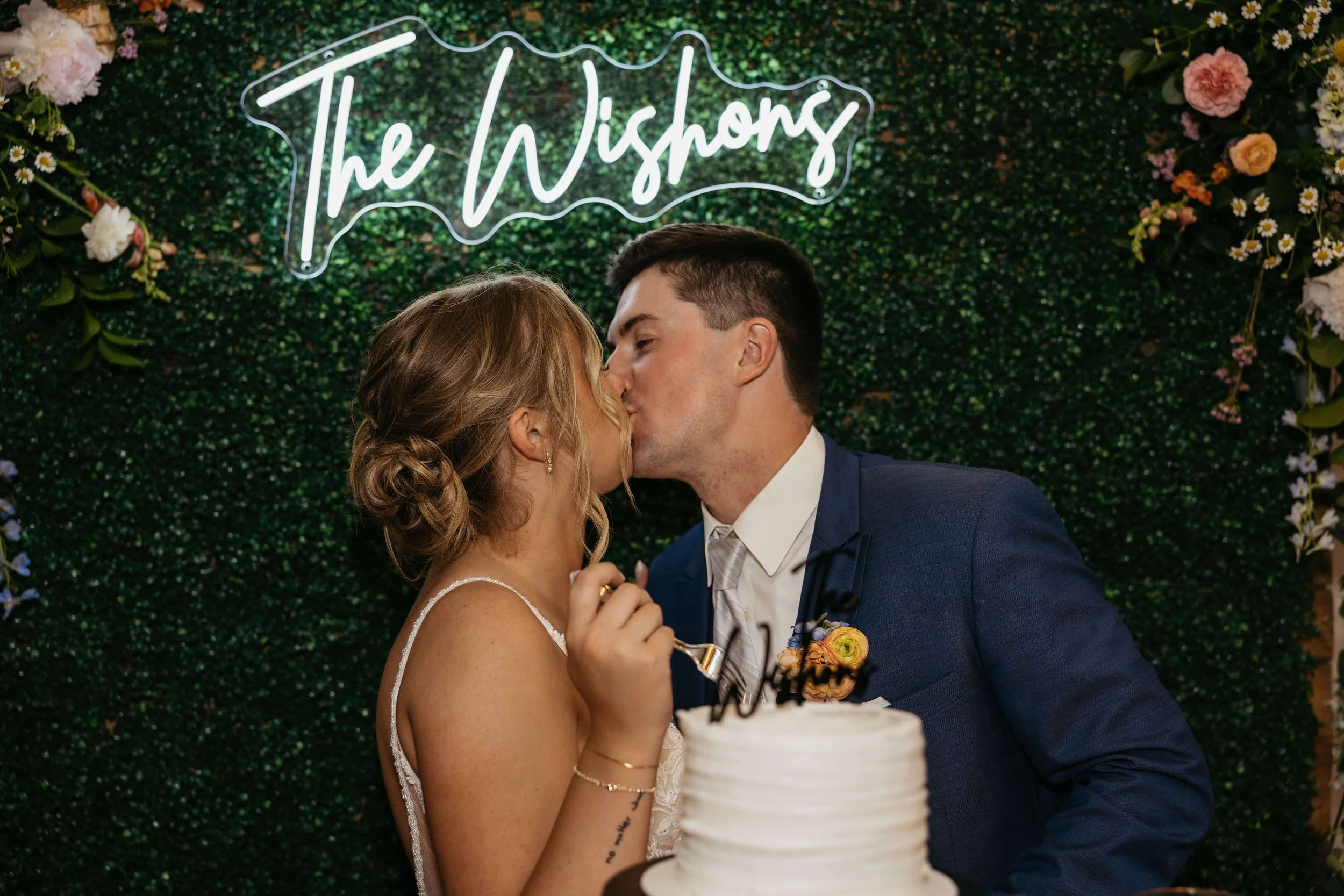 Bride and groom cutting cake in Sioux Falls.