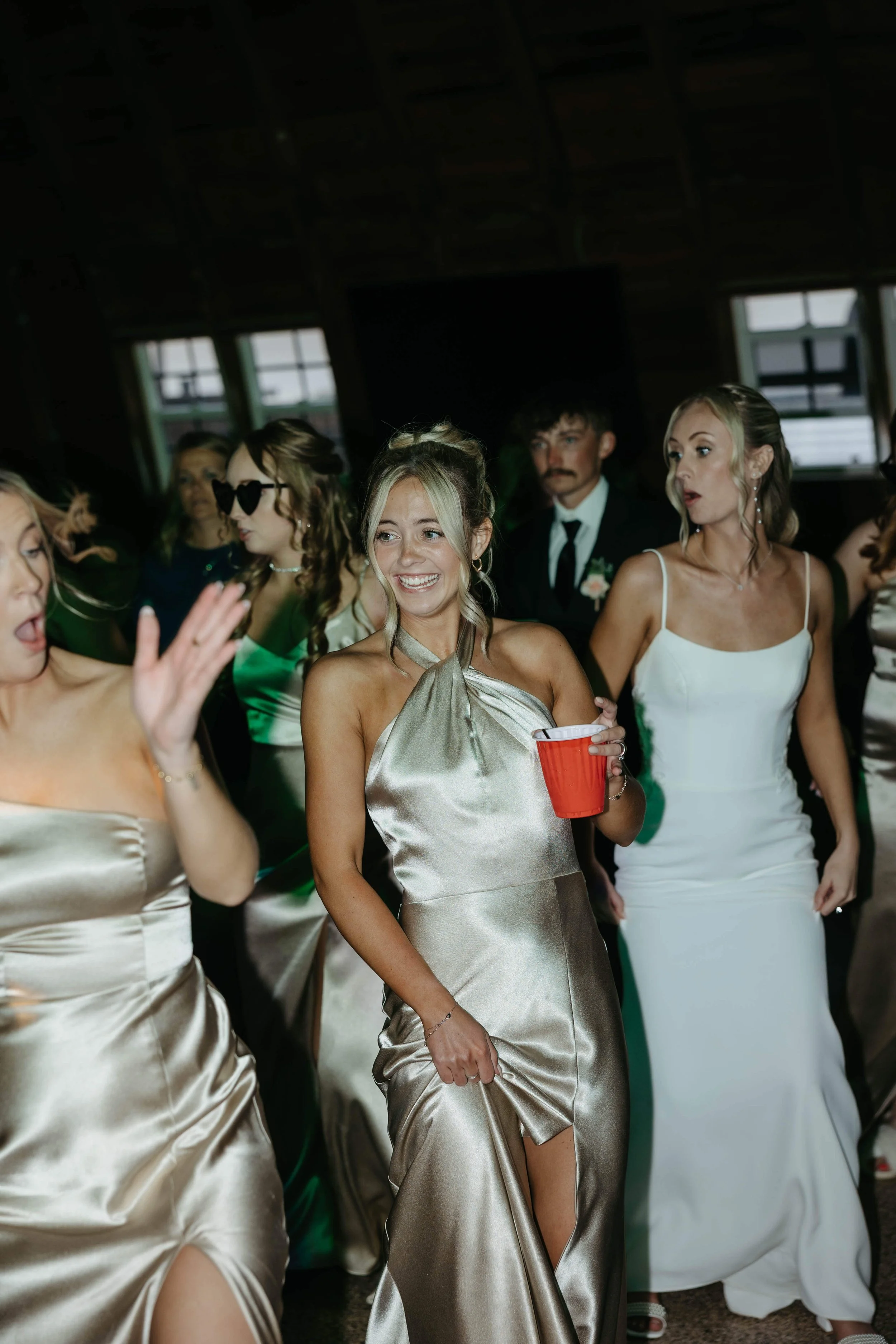Bride line dancing on the dance floor at her wedding in Sioux Falls.