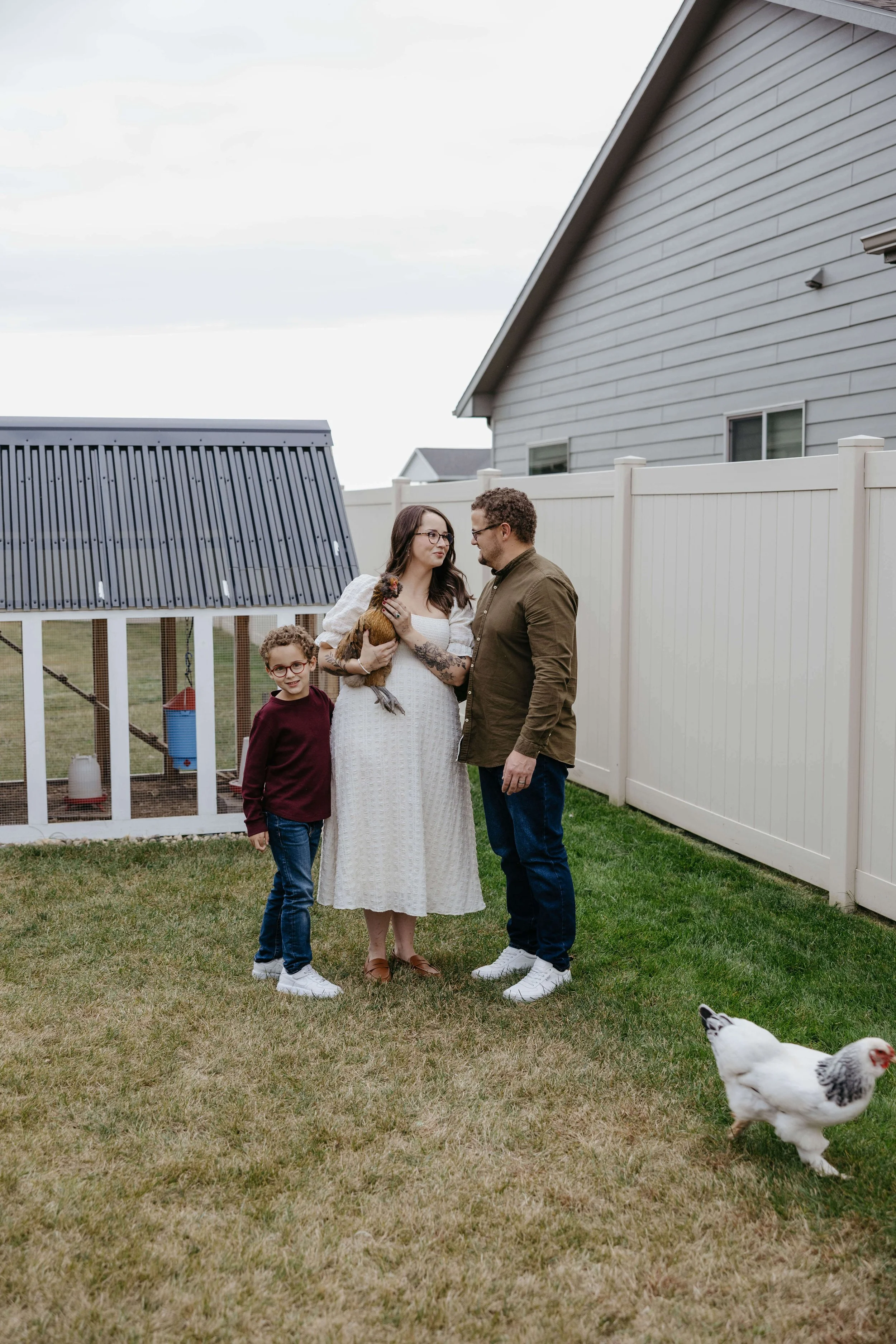 In home fall family photoshoot in Sioux Falls, South Dakota with chickens. 