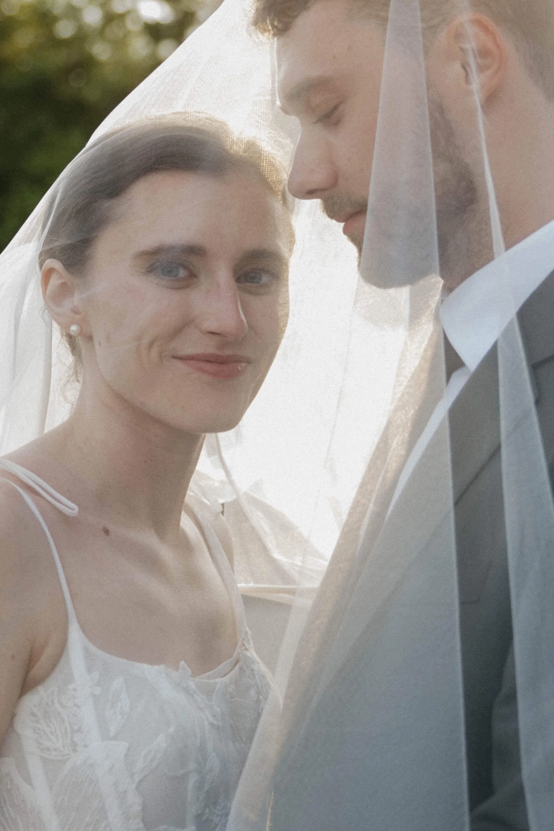 Couple doing dreamy sunset portraits at the Country Club in Sioux Falls, South Dakota with Jenna Heckel Photography.