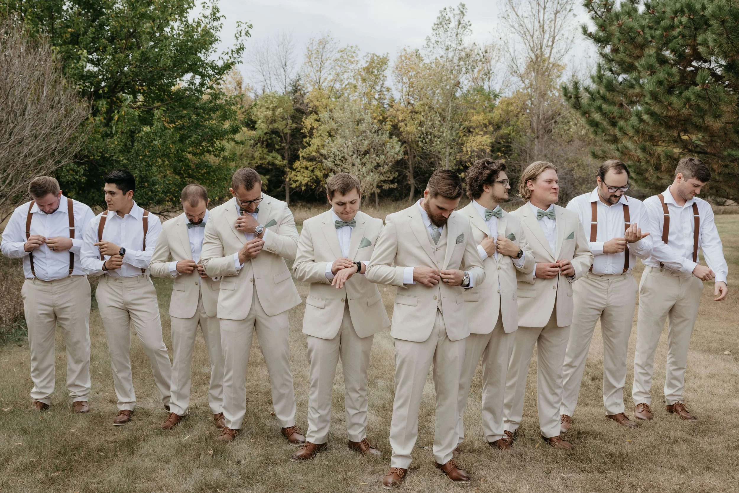 Groom getting ready at Granite Springs Lodge near Mitchell South Dakota photographed by Jenna Heckel Photography.
