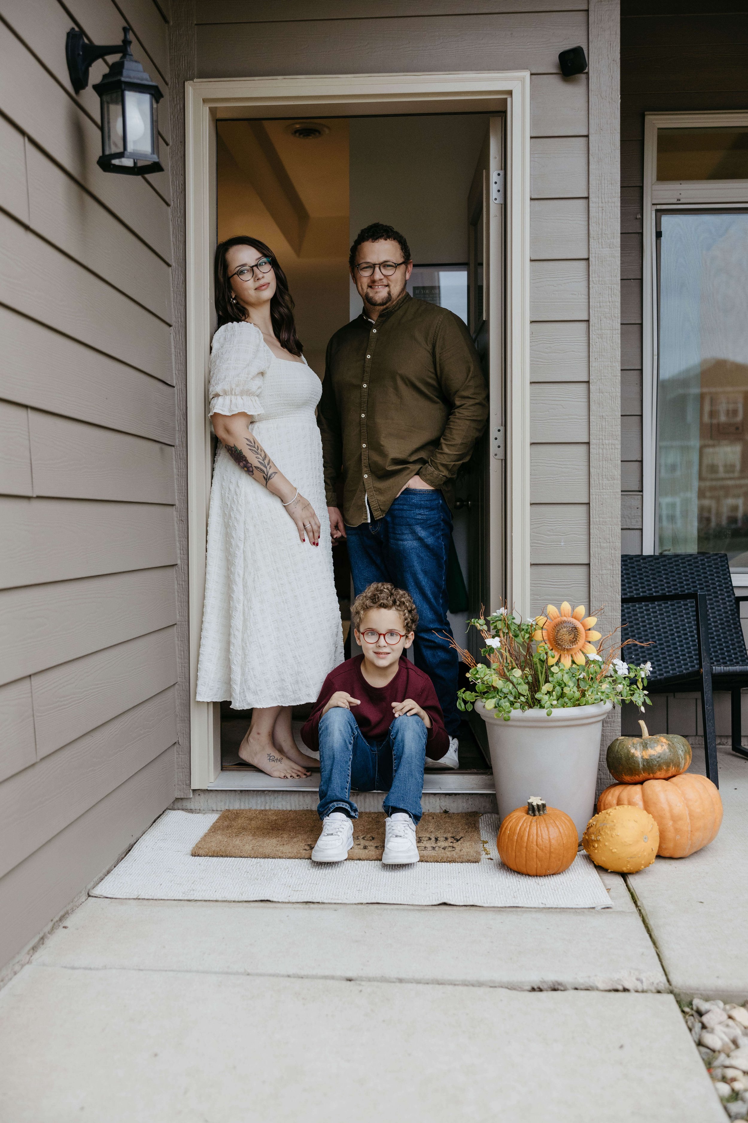 In home fall family photoshoot in Sioux Falls, South Dakota with chickens. 