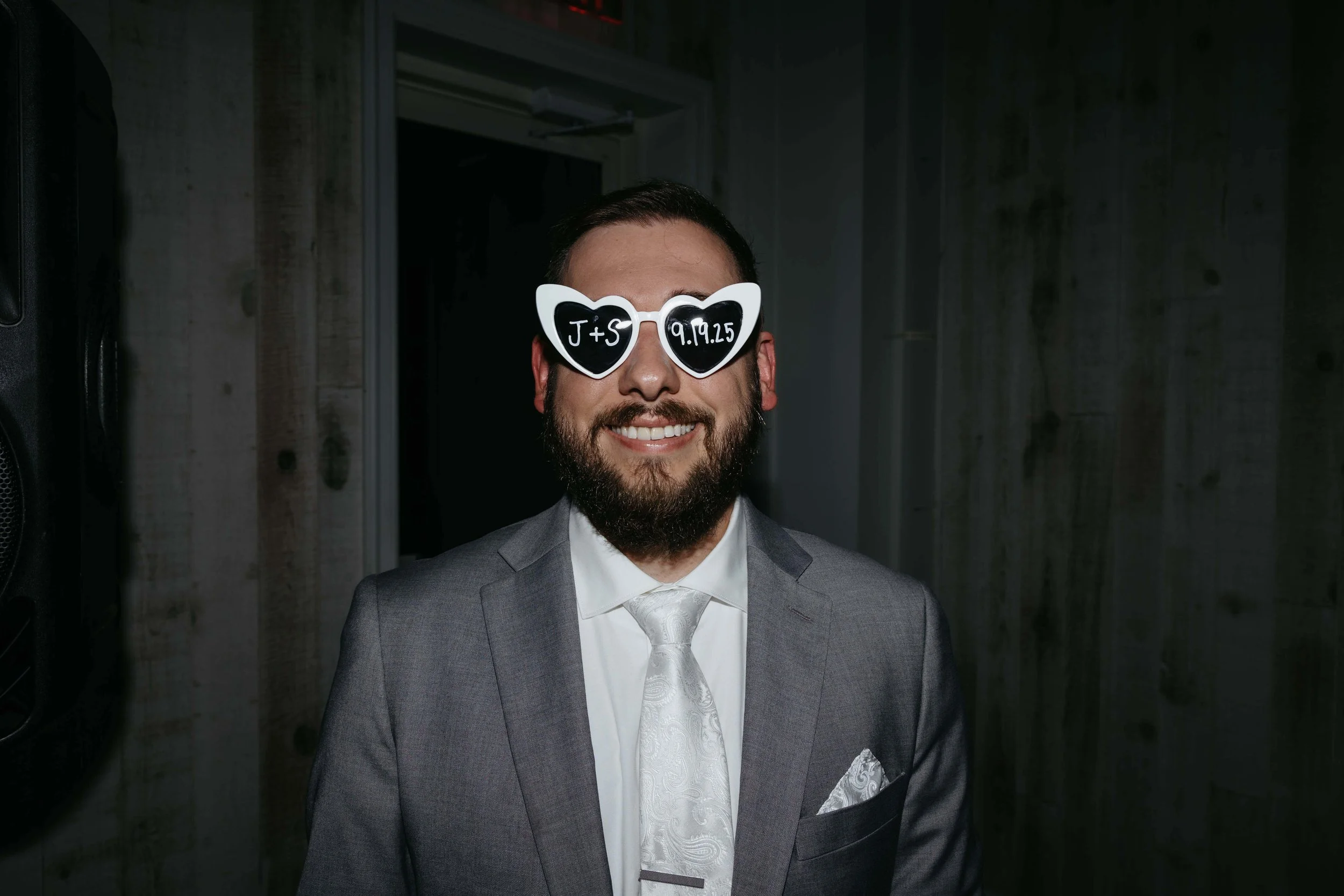 Bride and groom during their reception at Laural Ridge Barn in Sioux Falls, South Dakota. Photographed by Jenna Heckel Photography. 