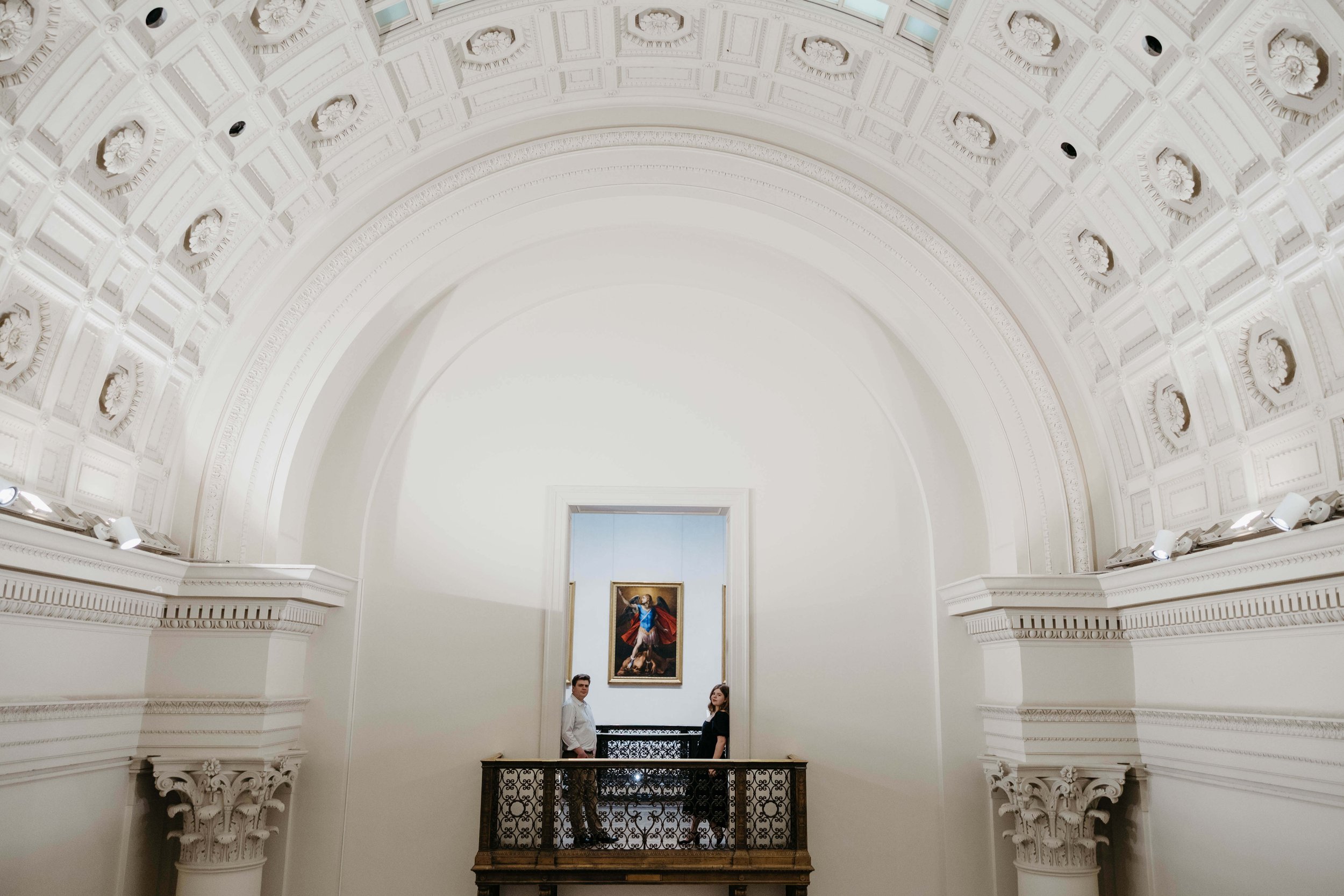 Couple in Minneapolis Institute of Art doing engagement photos. Shot by Jenna Heckel Photography. Photographer based in Sioux Falls, South Dakota.