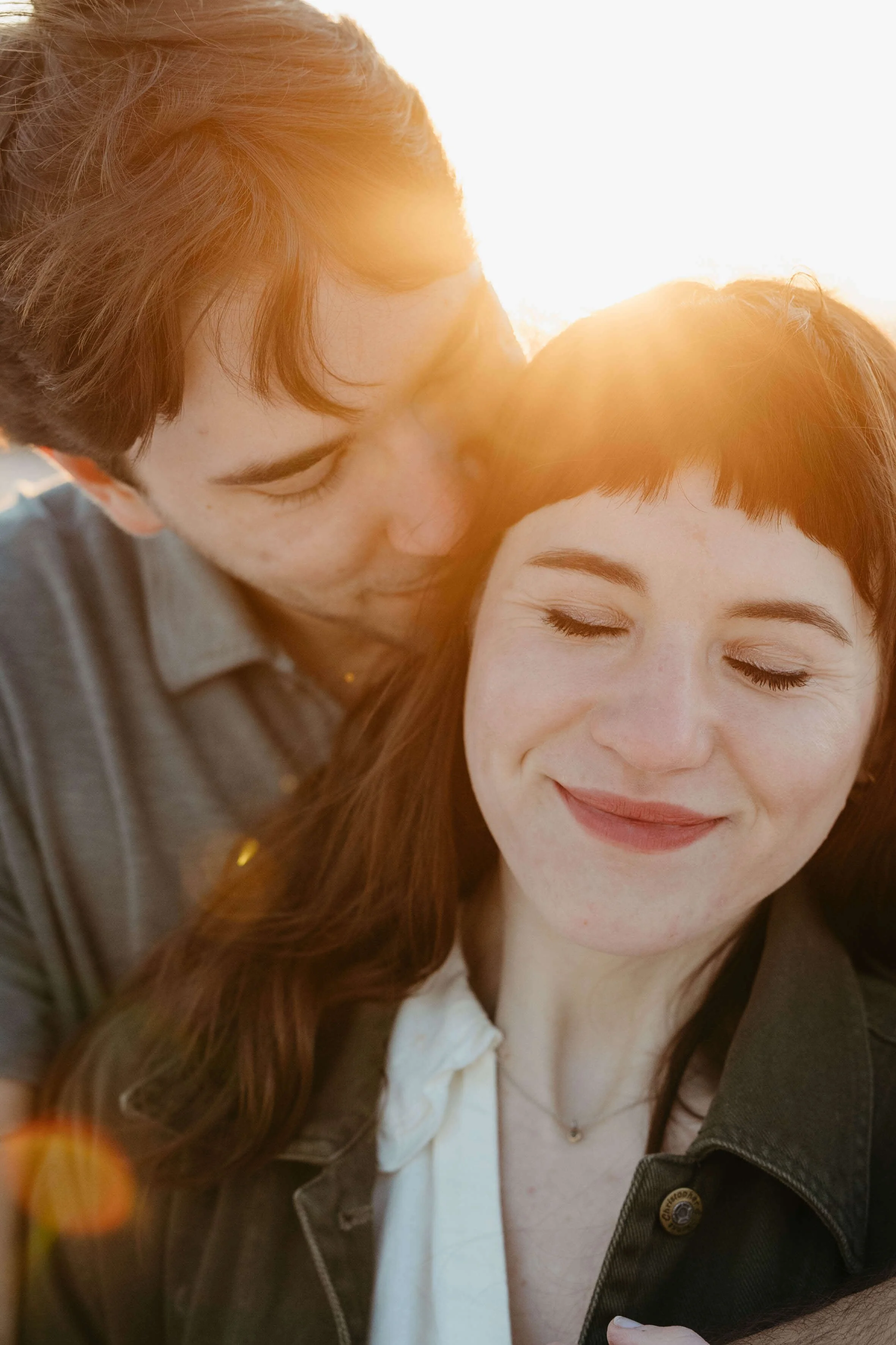 Engaged couple during a dreamy and romantic sunrise session at Good Earth State Park near Sioux Falls.