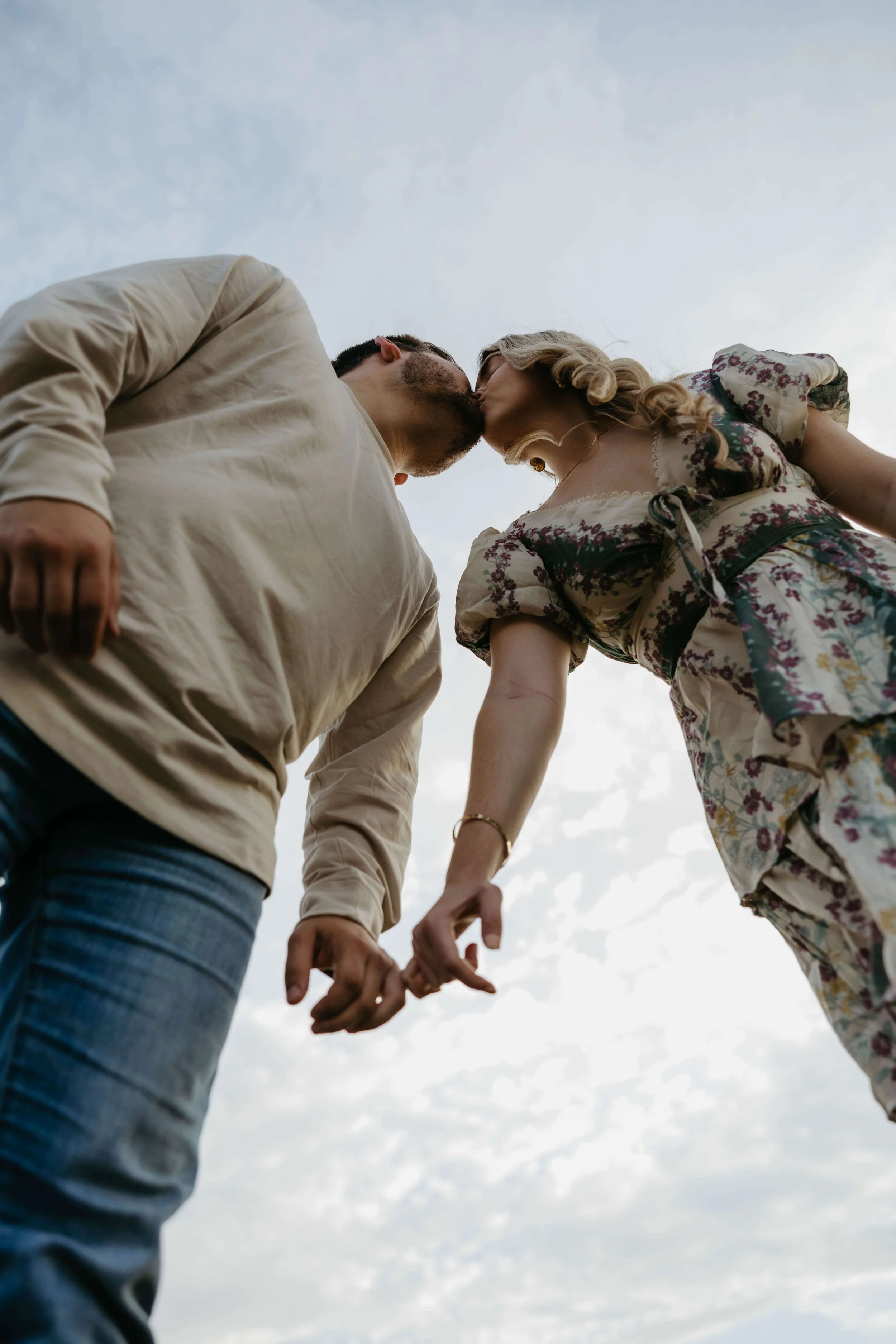 Vibey couple engagement session in Sioux Falls at sunset with Jenna Heckel Photography.