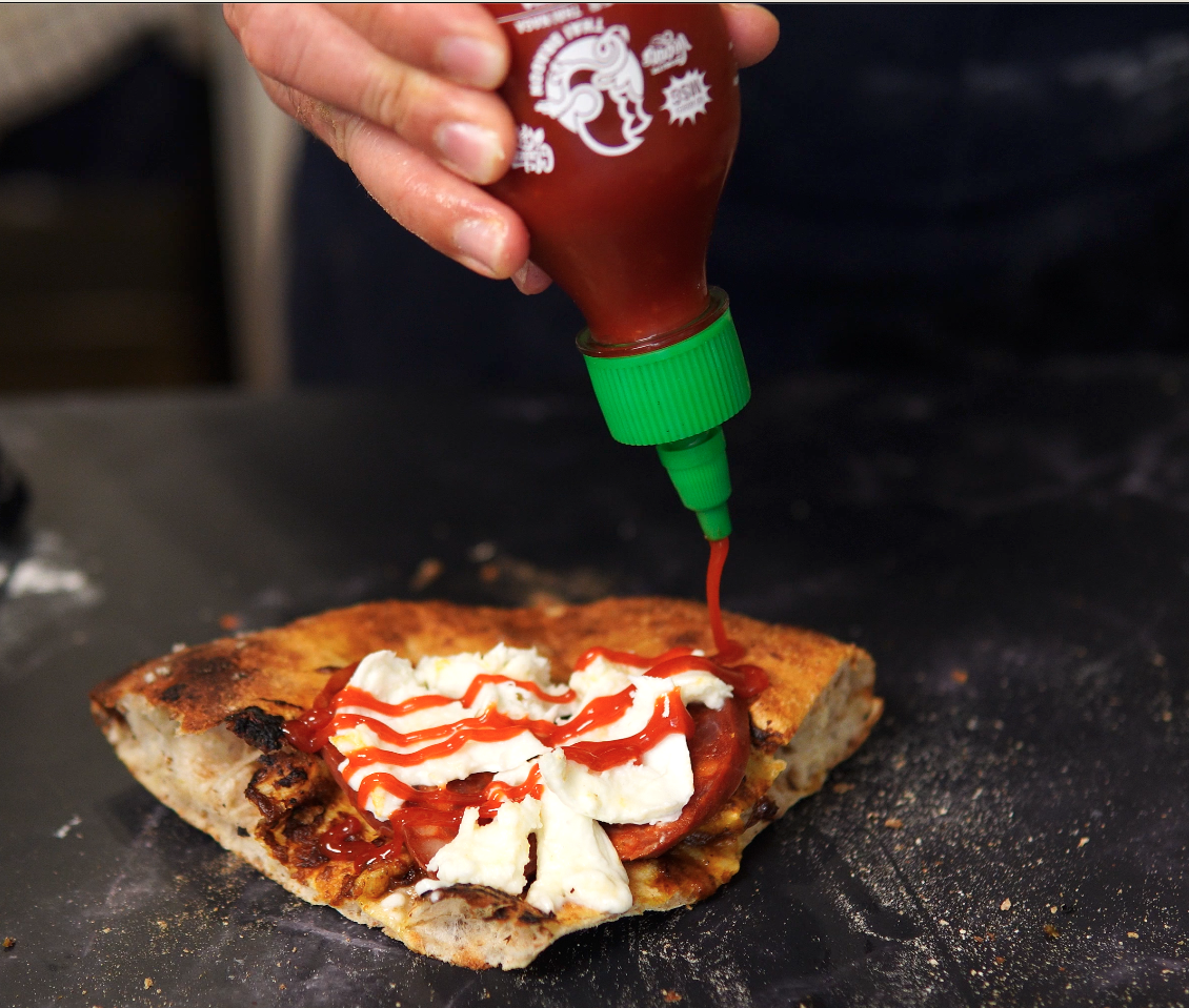 pepperoni pizza with sriracha