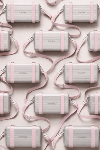 kling_20251219_Image_to_Video_A_high_end_3041_0 (1).gif