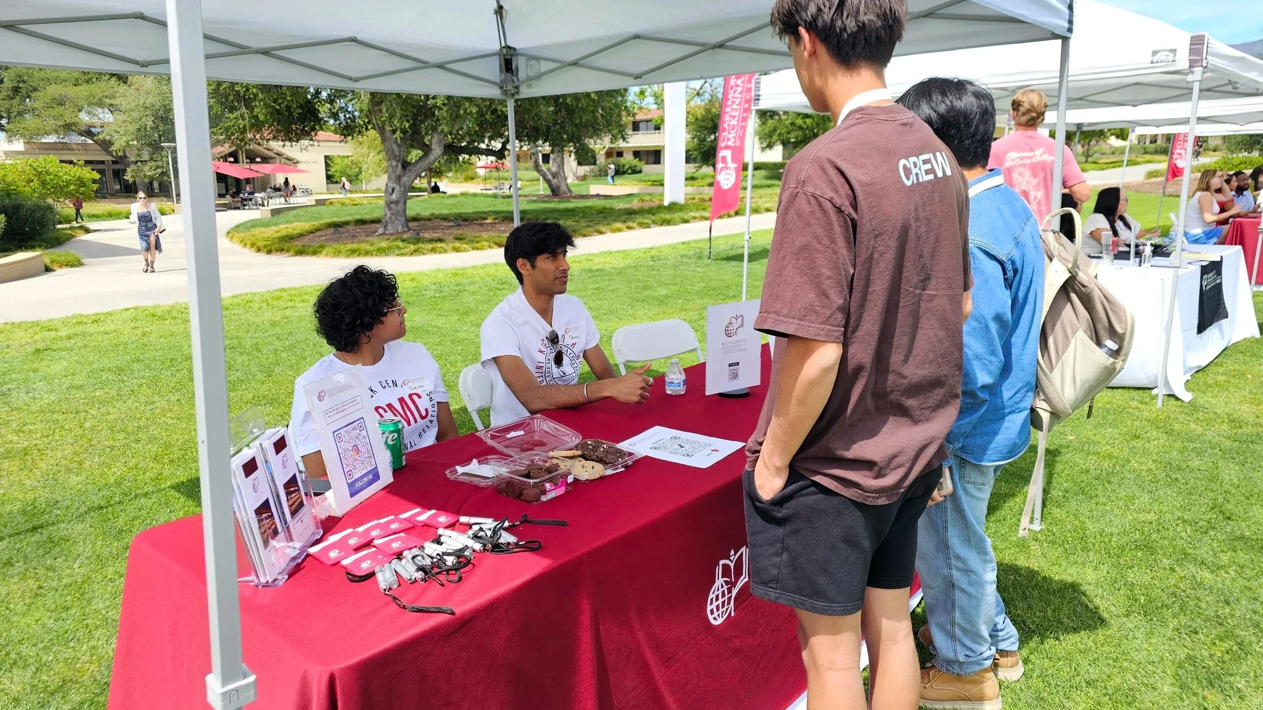 Keck Center Program Assistants speaking with newly admitted CMC students at Inside CMC, April 2026