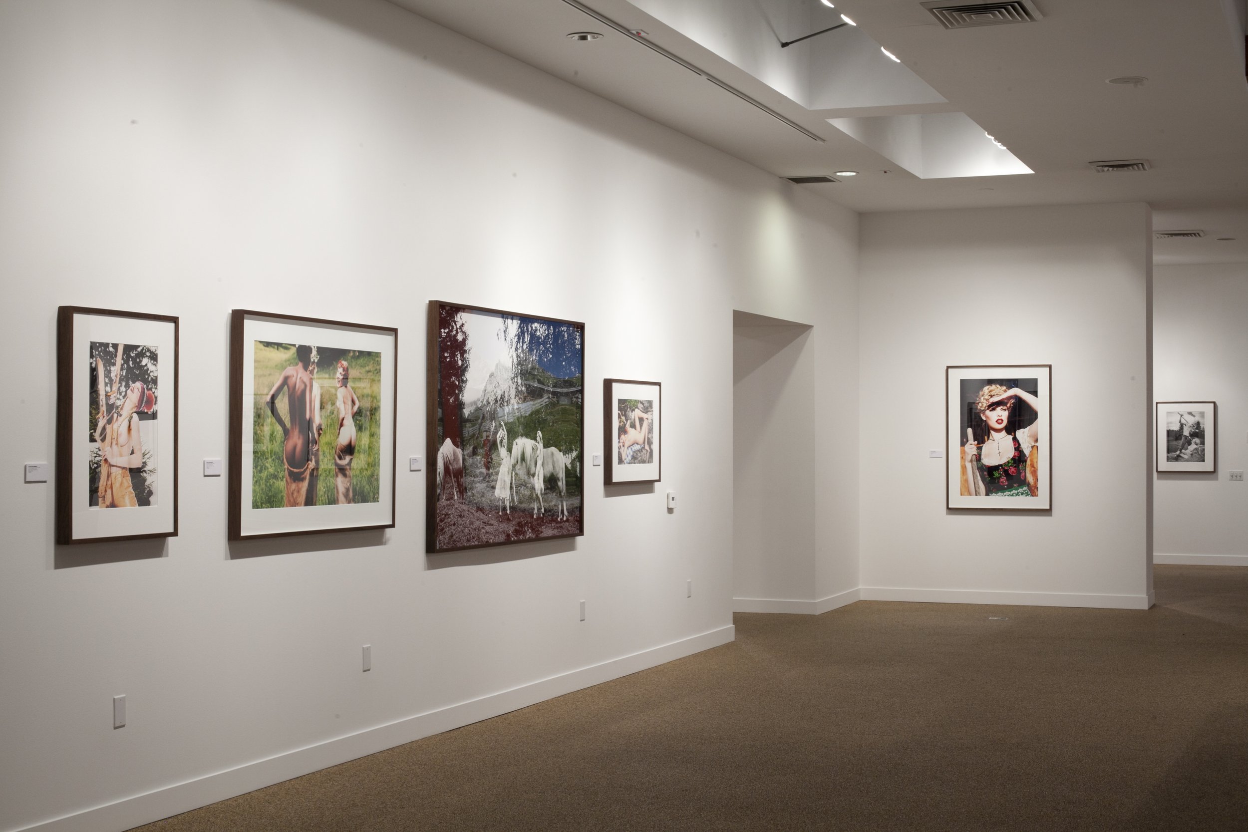 TASCHEN Gallery Los Angeles featuring Ellen von Unwerth's Heimat exhibition. Installation photographs by Gregory Bojorquez.