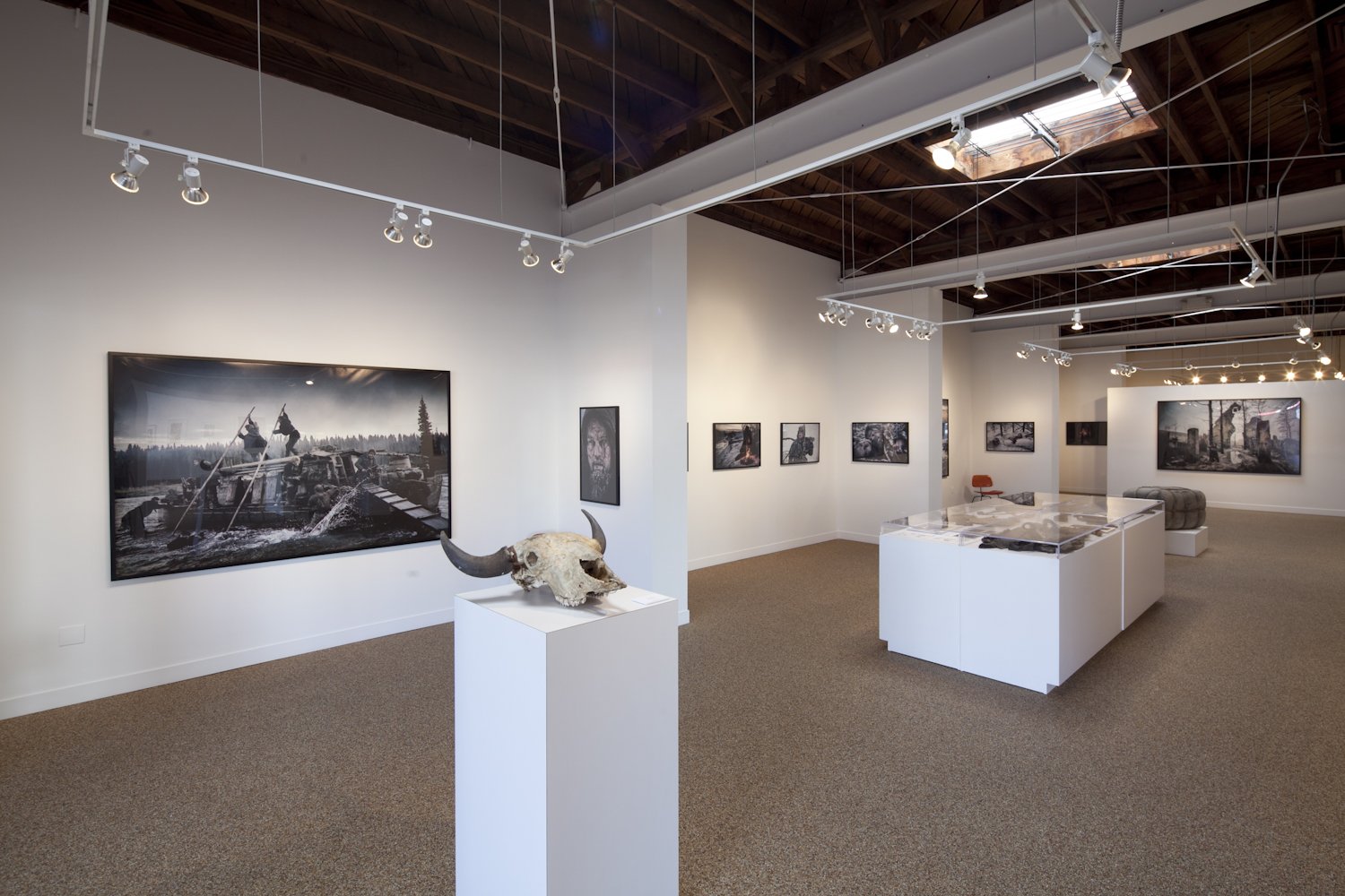 TASCHEN Gallery Los Angeles featuring Alejandro González Iñárritu: The Revenant an exhibition of still photographs from the feature film by the same name taken by Kimberley French. Installation photographs by Gregory Bojorquez.
