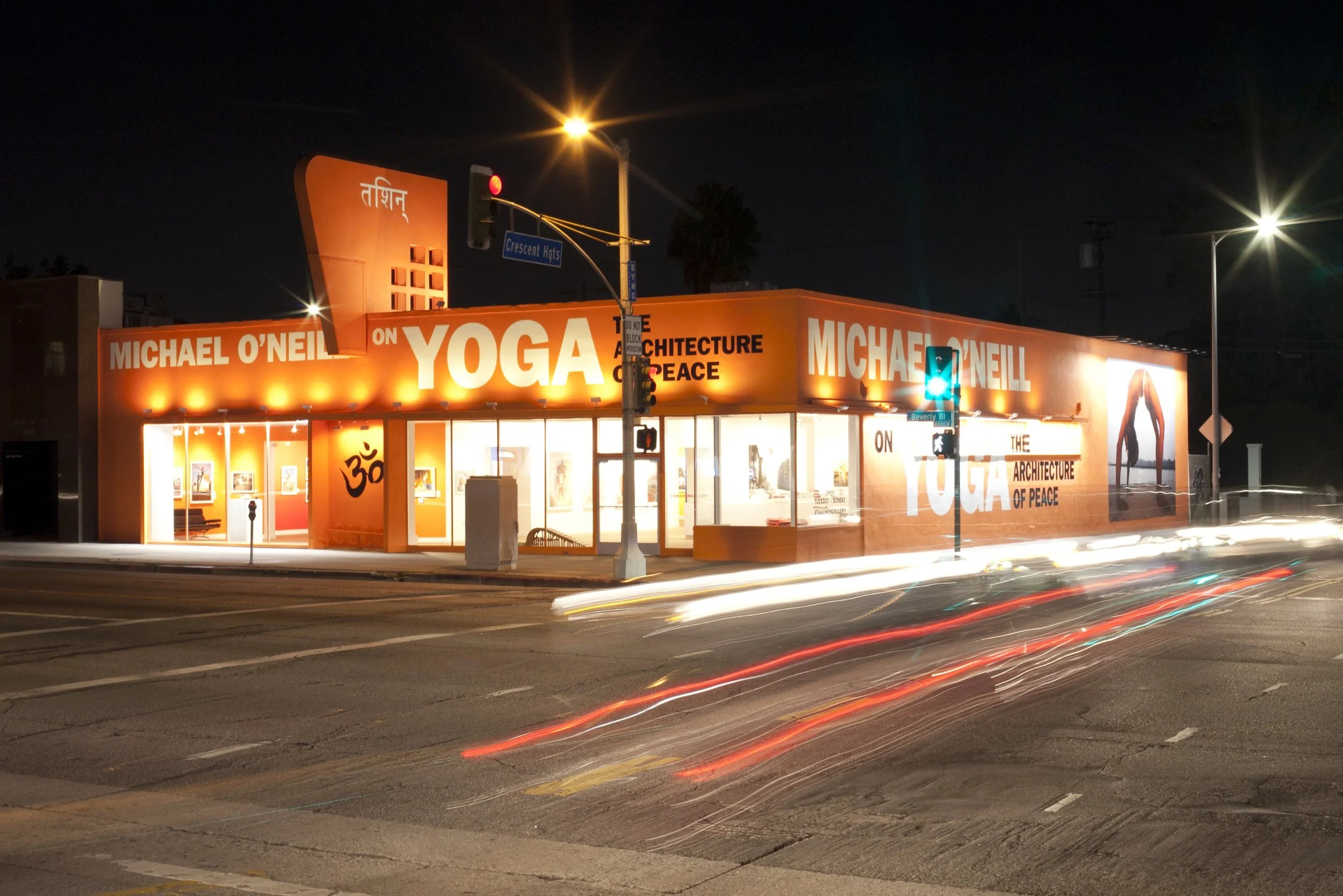 TASCHEN Gallery Los Angeles featuring Michael O'Neill's YOGA: The Architecture of Peace exhibition. Exterior photograph by Gregory Bojorquez