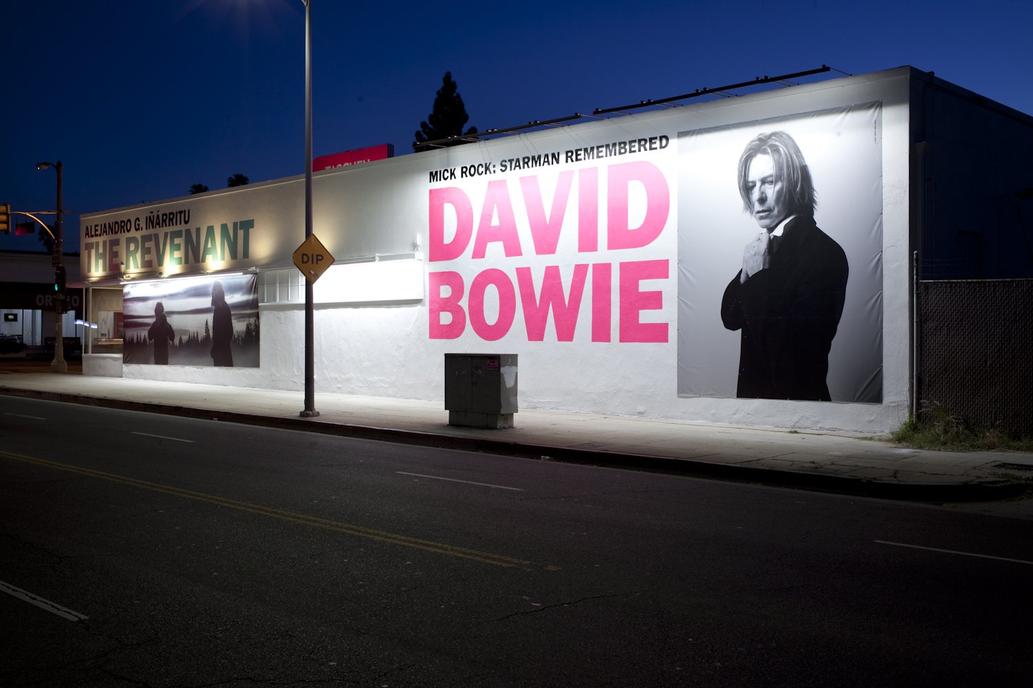 TASCHEN Gallery Los Angeles exterior featuring a dual exhibitions featuring Alejandro González Iñárritu: The Revenant and Mick Rock: Starman Remembered,  David Bowie. Exterior Photographs by Gregory Bojorquez.