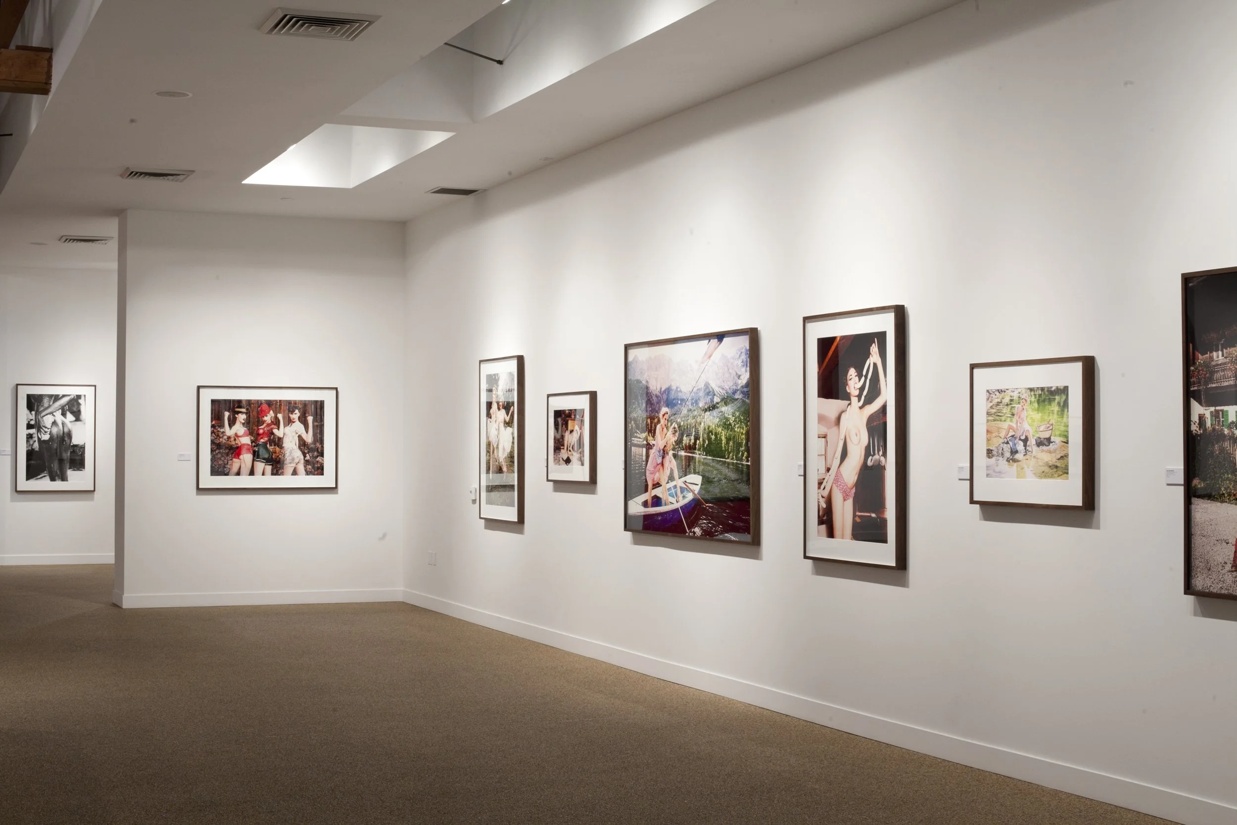 TASCHEN Gallery Los Angeles featuring Ellen von Unwerth's Heimat exhibition. Installation photographs by Gregory Bojorquez.