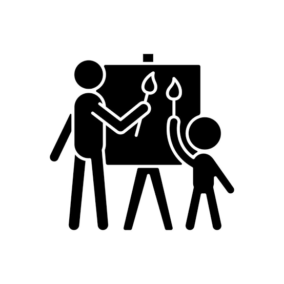 This is a picture of an adult and child painting on an easel in play therapy in San Antonio and Schertz