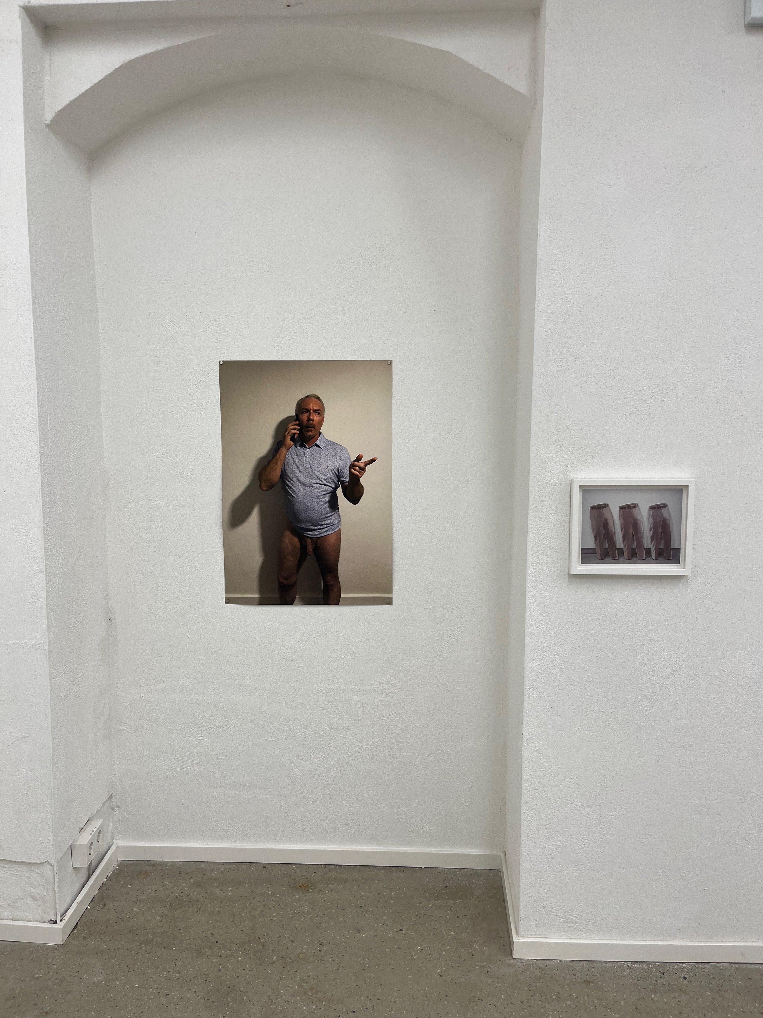 Zefrey Throwell, "The Missing Asshole, life companion to, Khakis by Grayson Cox", 2026, Printed poster and printed reproduction of the the work being referenced
