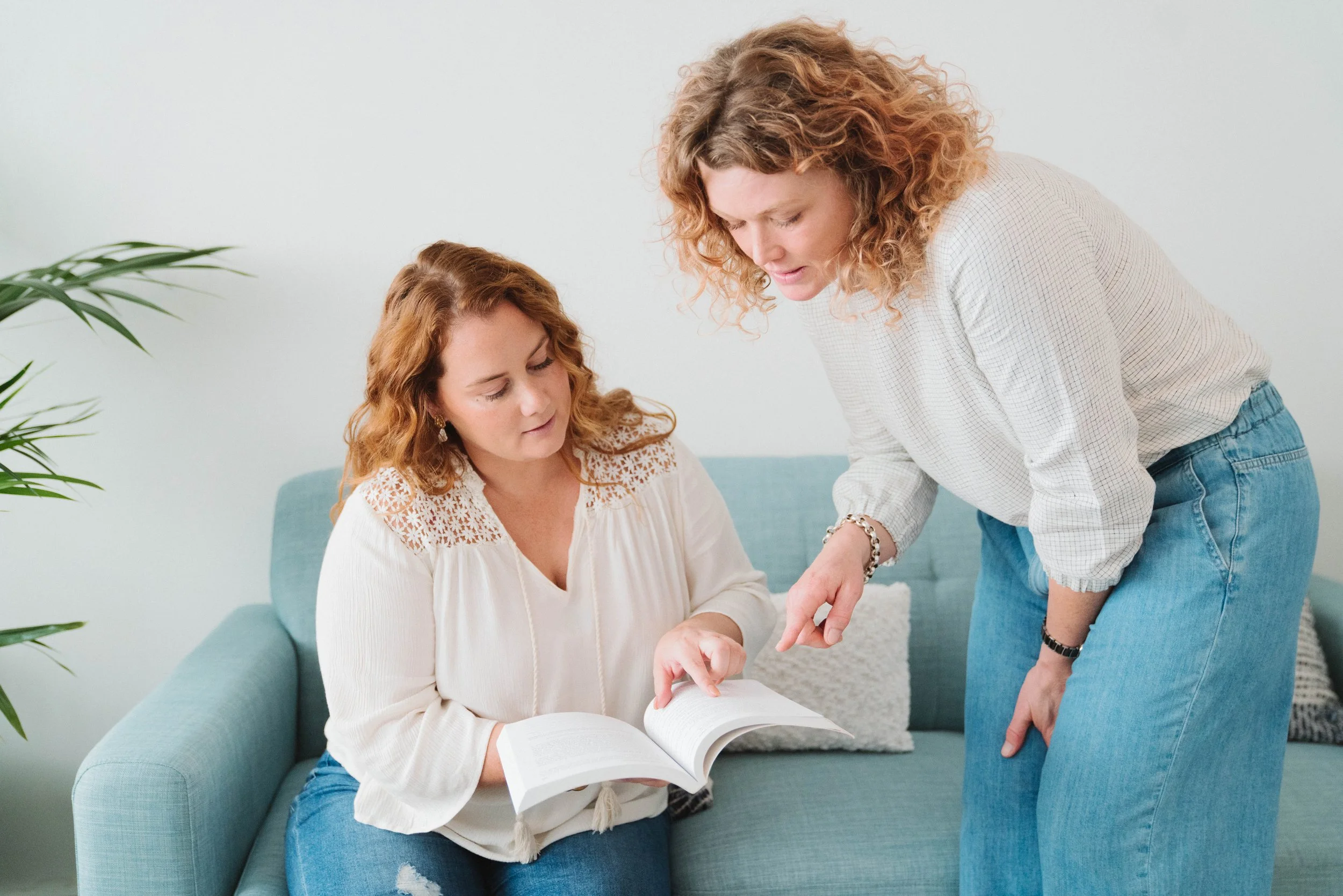 Therapist supporting a client struggling with alcohol use and depression during a one-on-one session.