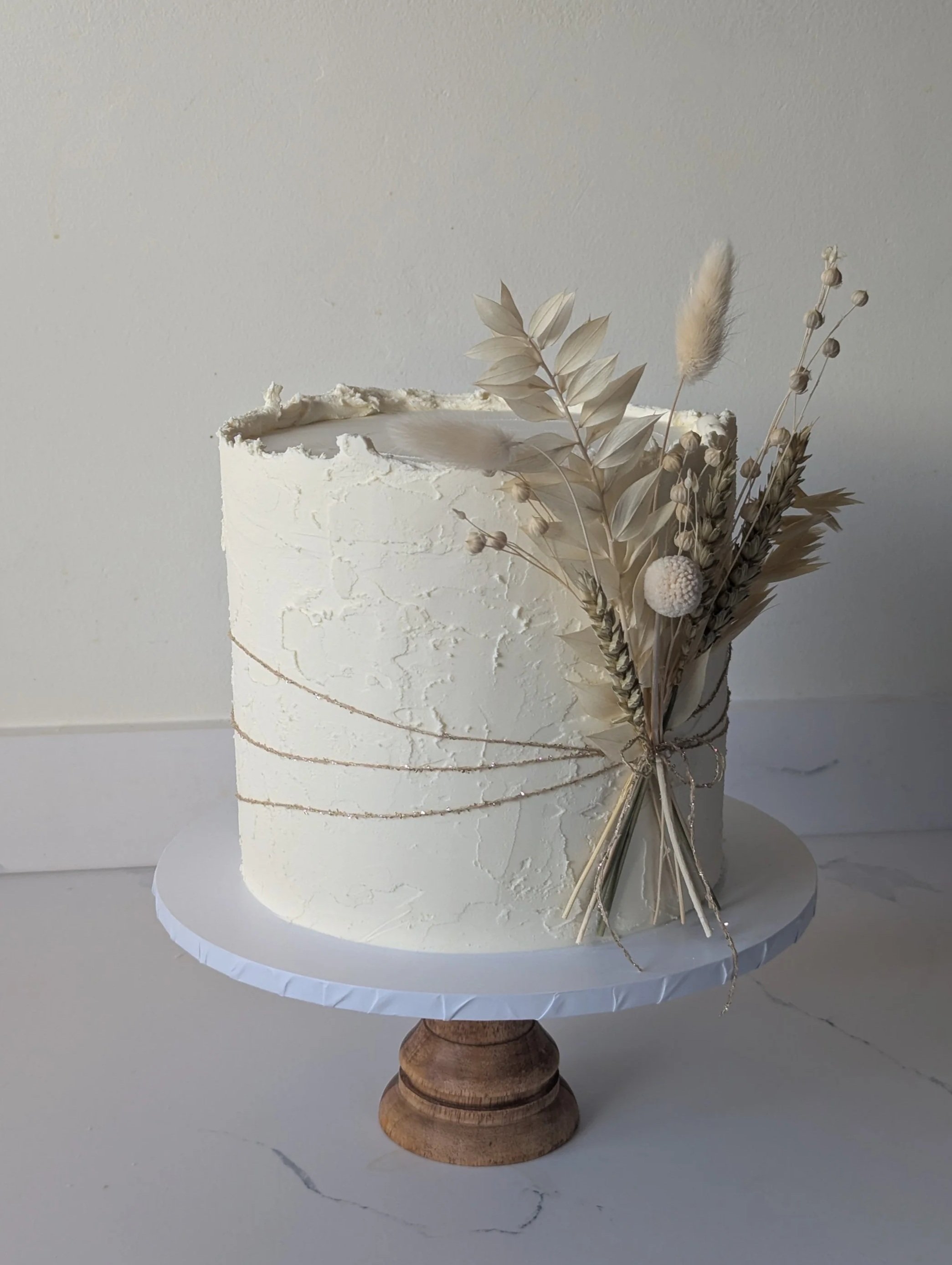 Rustic dried flower occasion cake