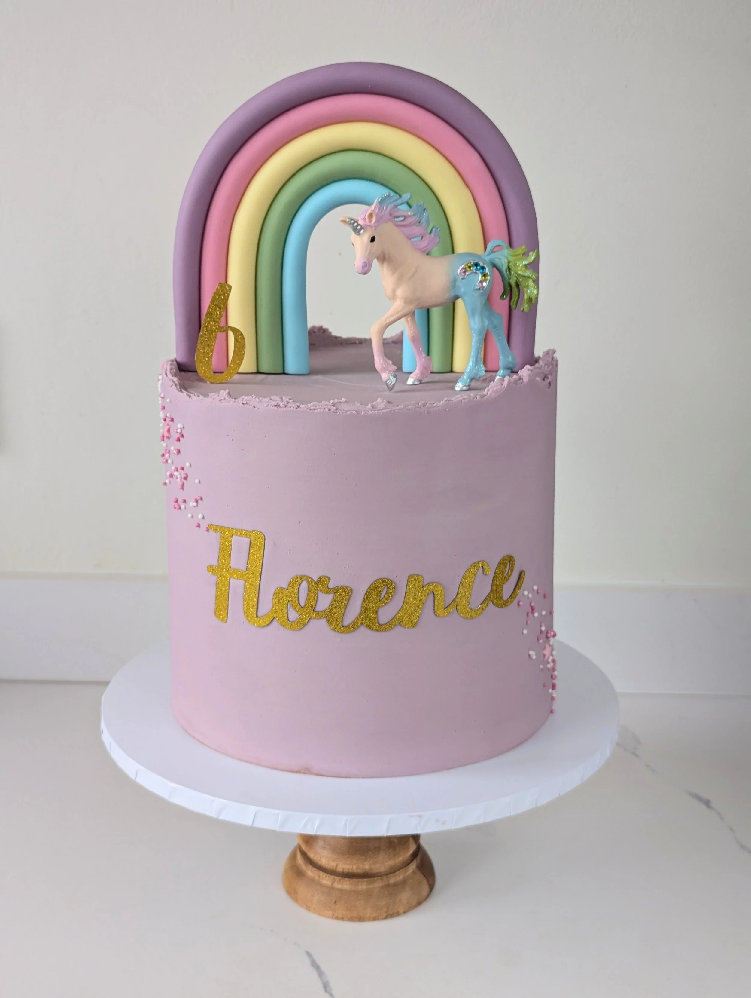 Girls birthday cake Wiltshire with rainbow and unicorn