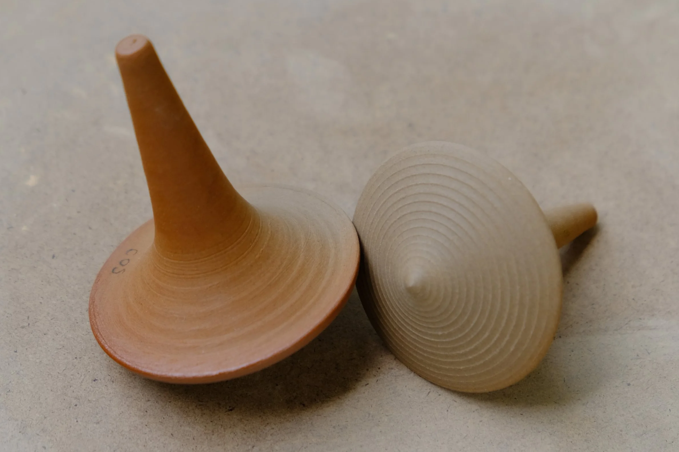 Spinning tops made by Claudia Surrage