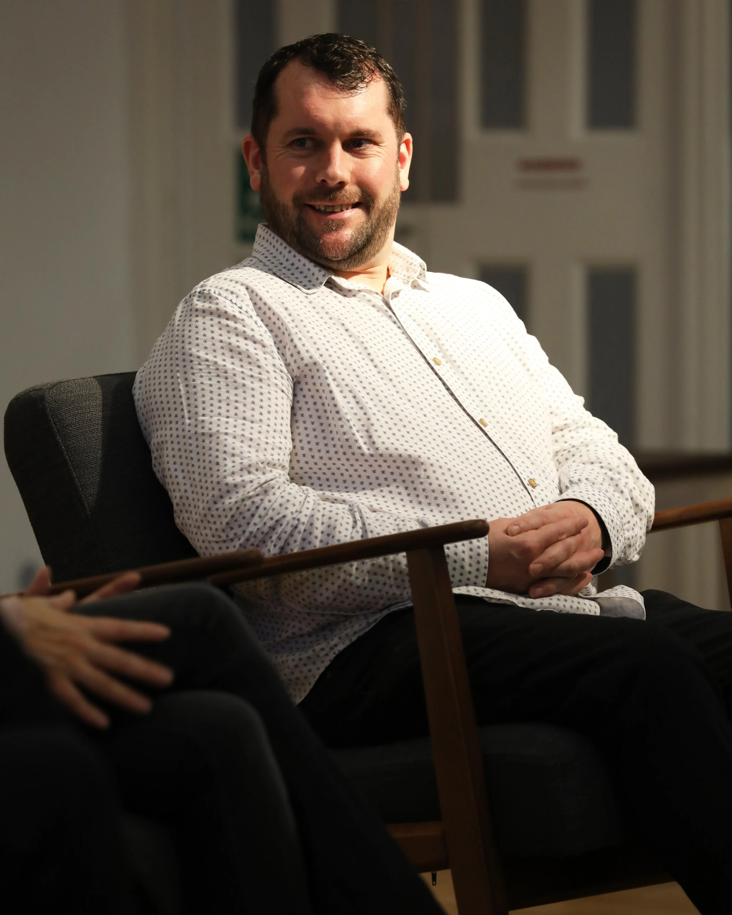 Eoghan portrait smiling.JPG