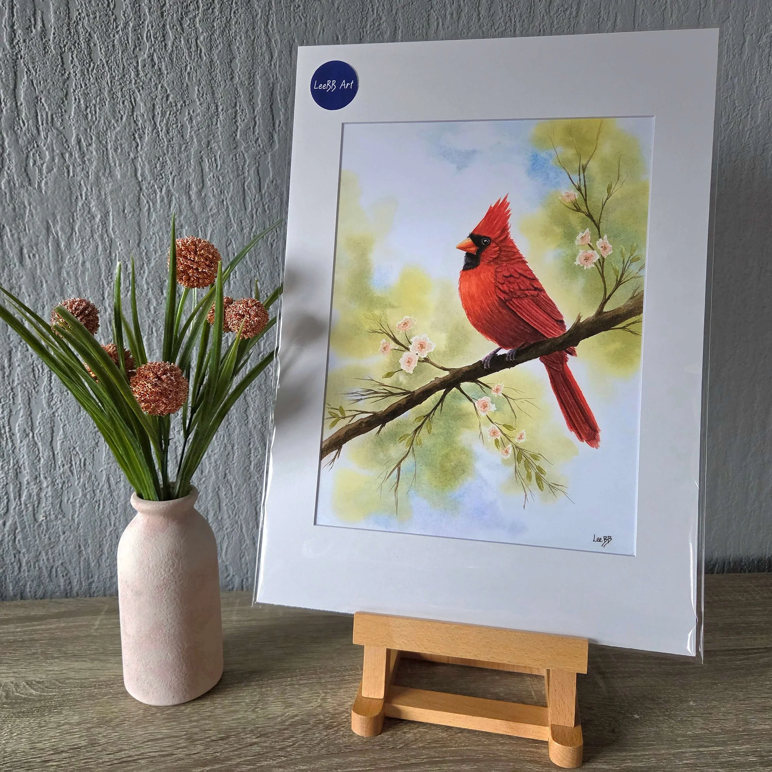 Cardinal Spring presented in a mount with backing board in a cellophane packet