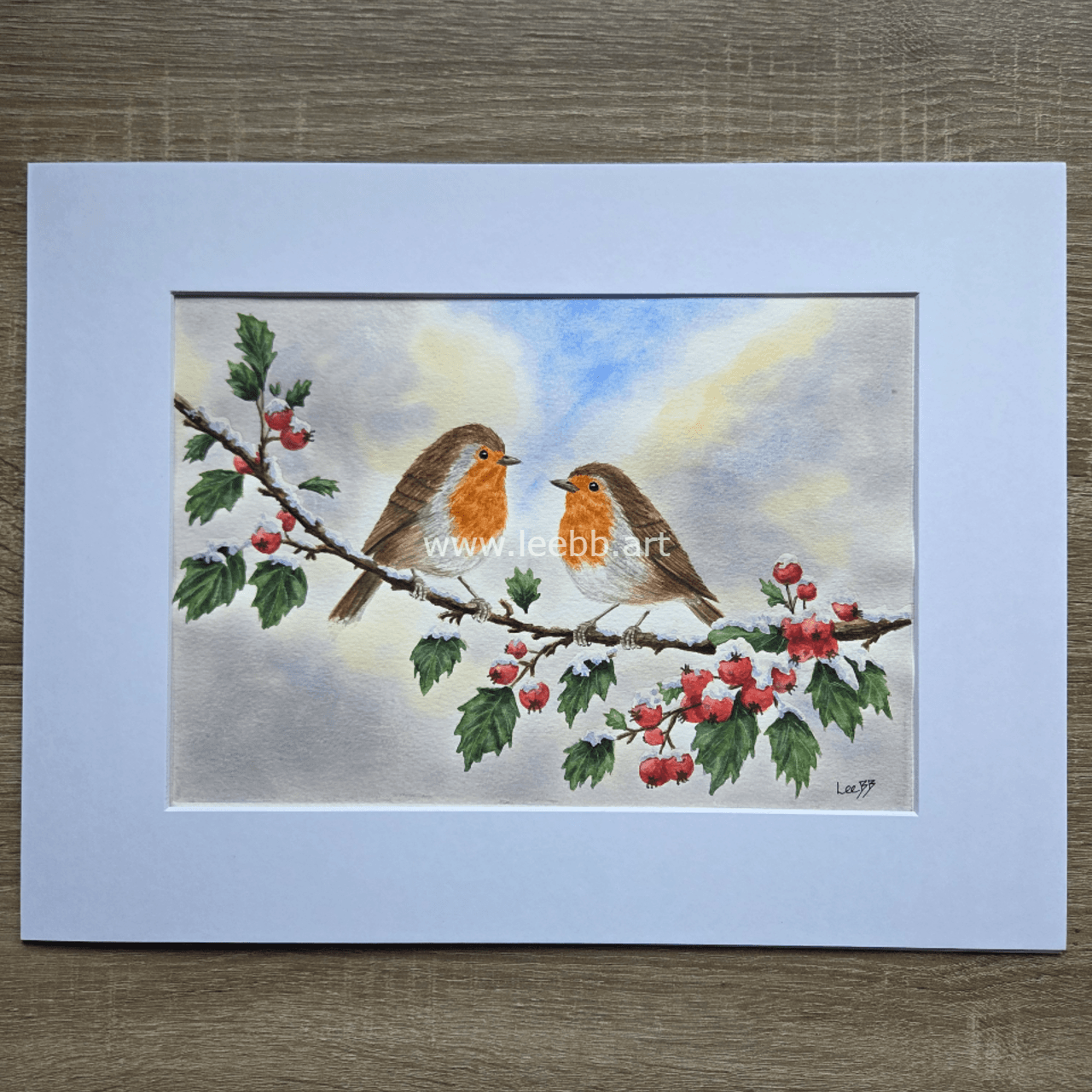 Original watercolour painting Winter Companions featuring robins in a traditional snowy winter scene