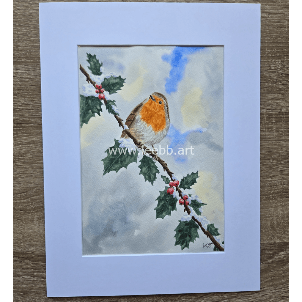 Original watercolour painting Winter Wonder featuring a robin in a bright snow-covered winter setting
