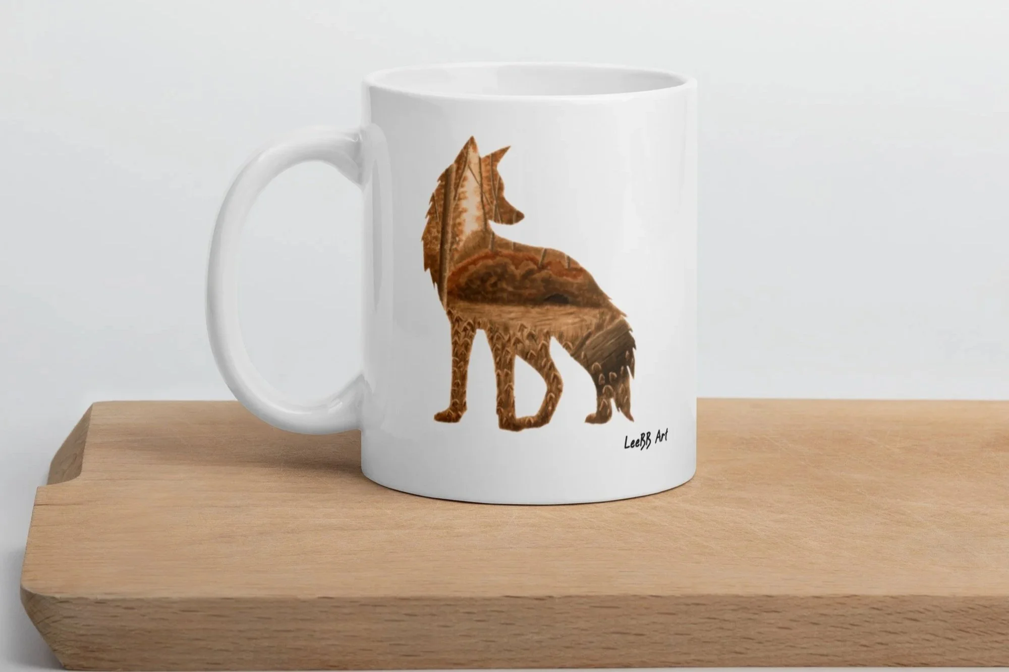 White LeeBB Art mug featuring a brown woodland fox double-exposure design