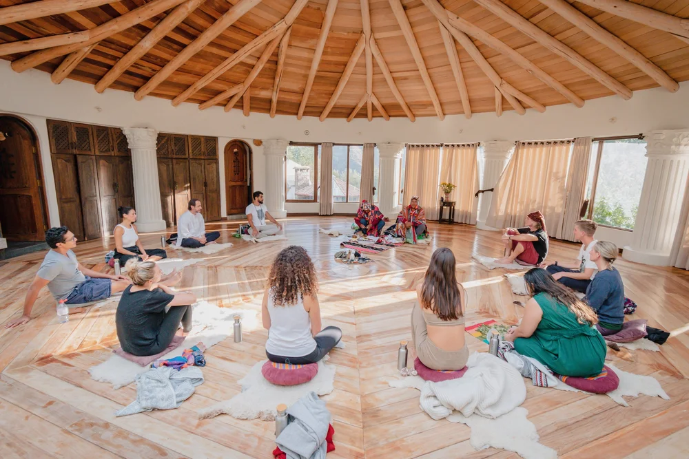Glass-walled yoga temple overlooking the mountains of the Sacred Valley, Peru