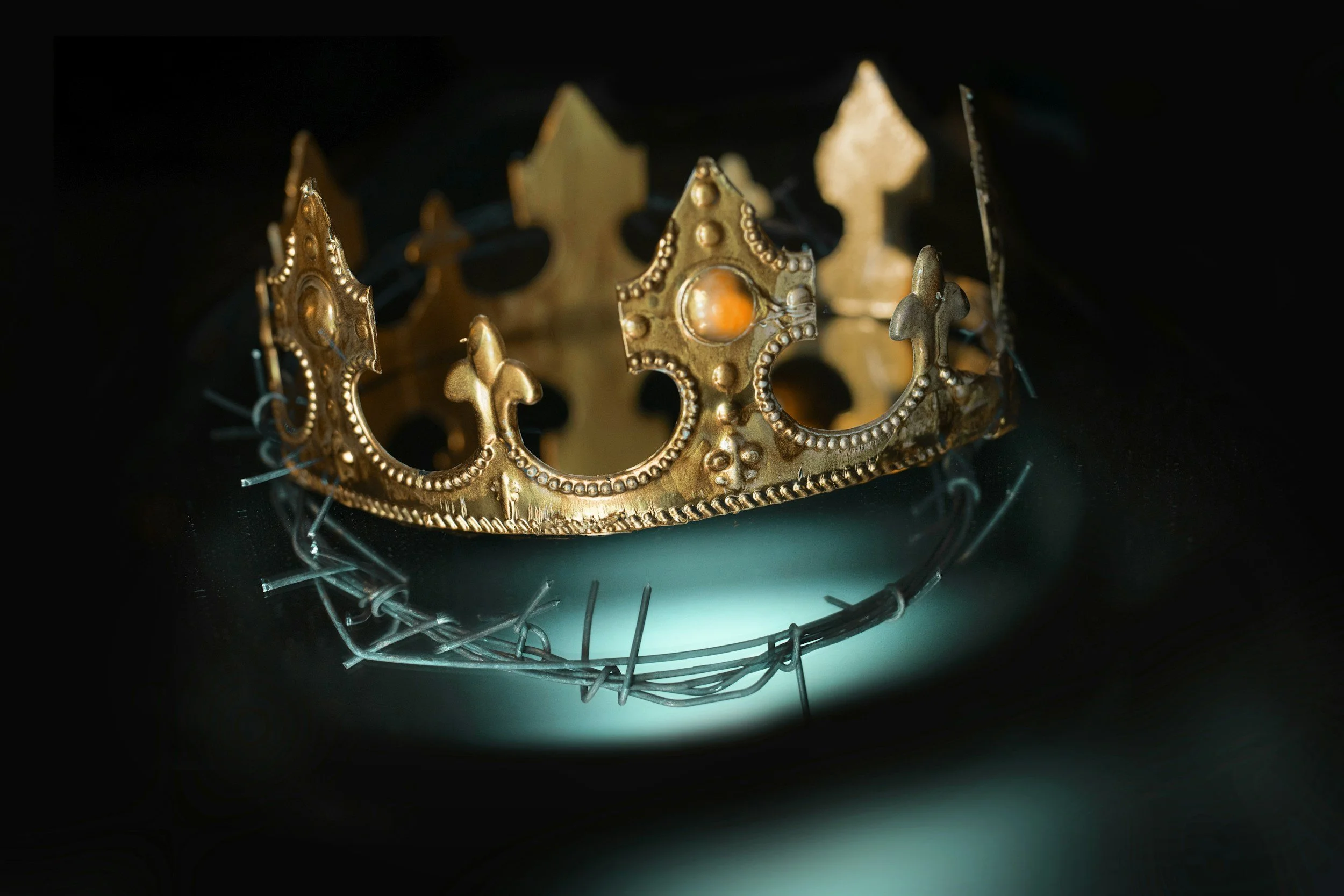 Crown on barbed wire