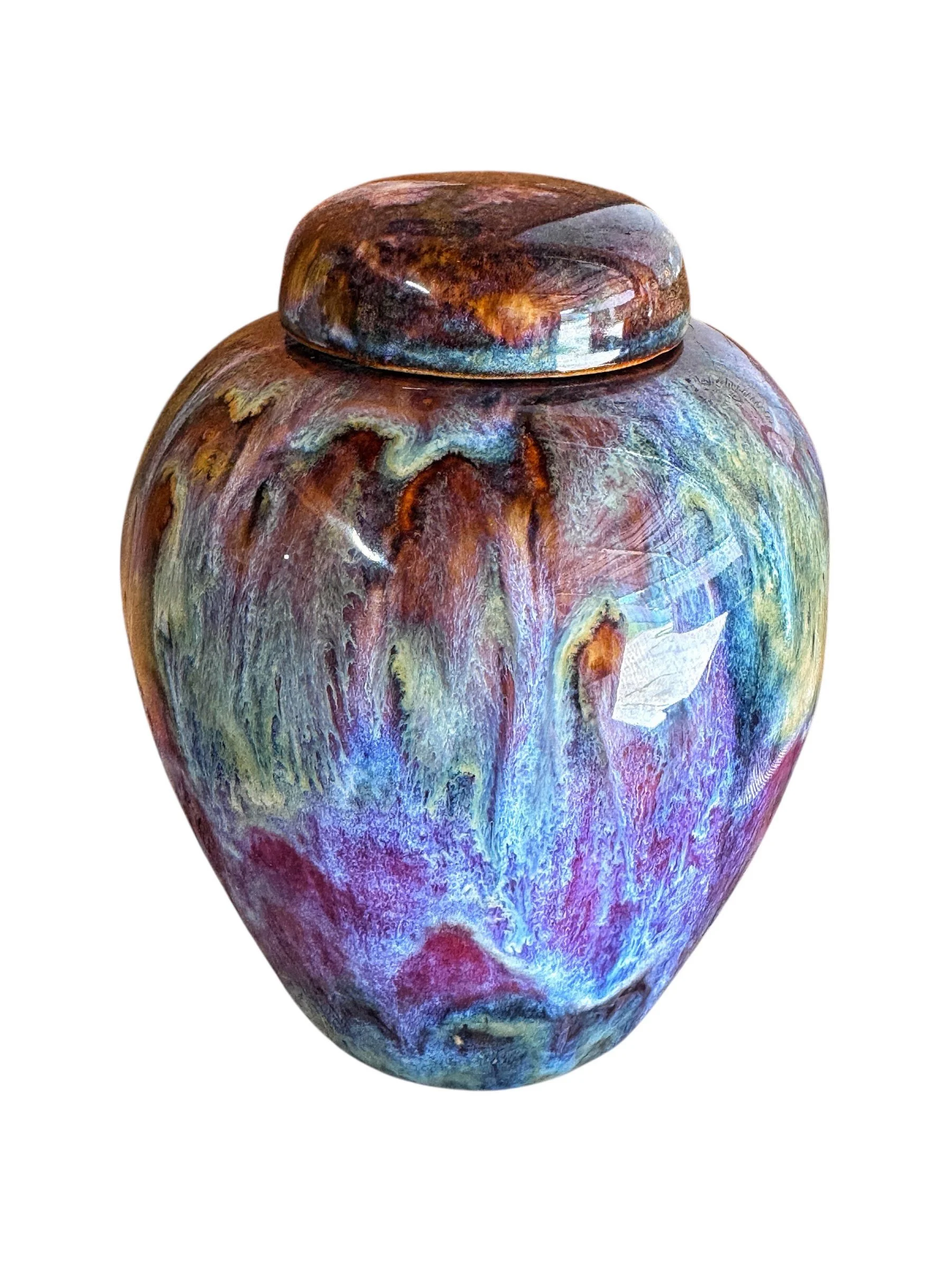 Colorful, abstract painting on a rounded, smooth surface.