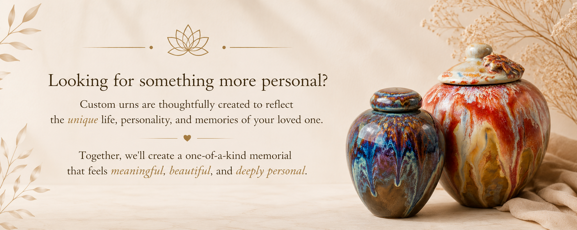 Two colorful, artistically crafted ceramic urns with abstract, marbled patterns in orange, blue, and cream, set against a soft, beige background with dried floral accents.