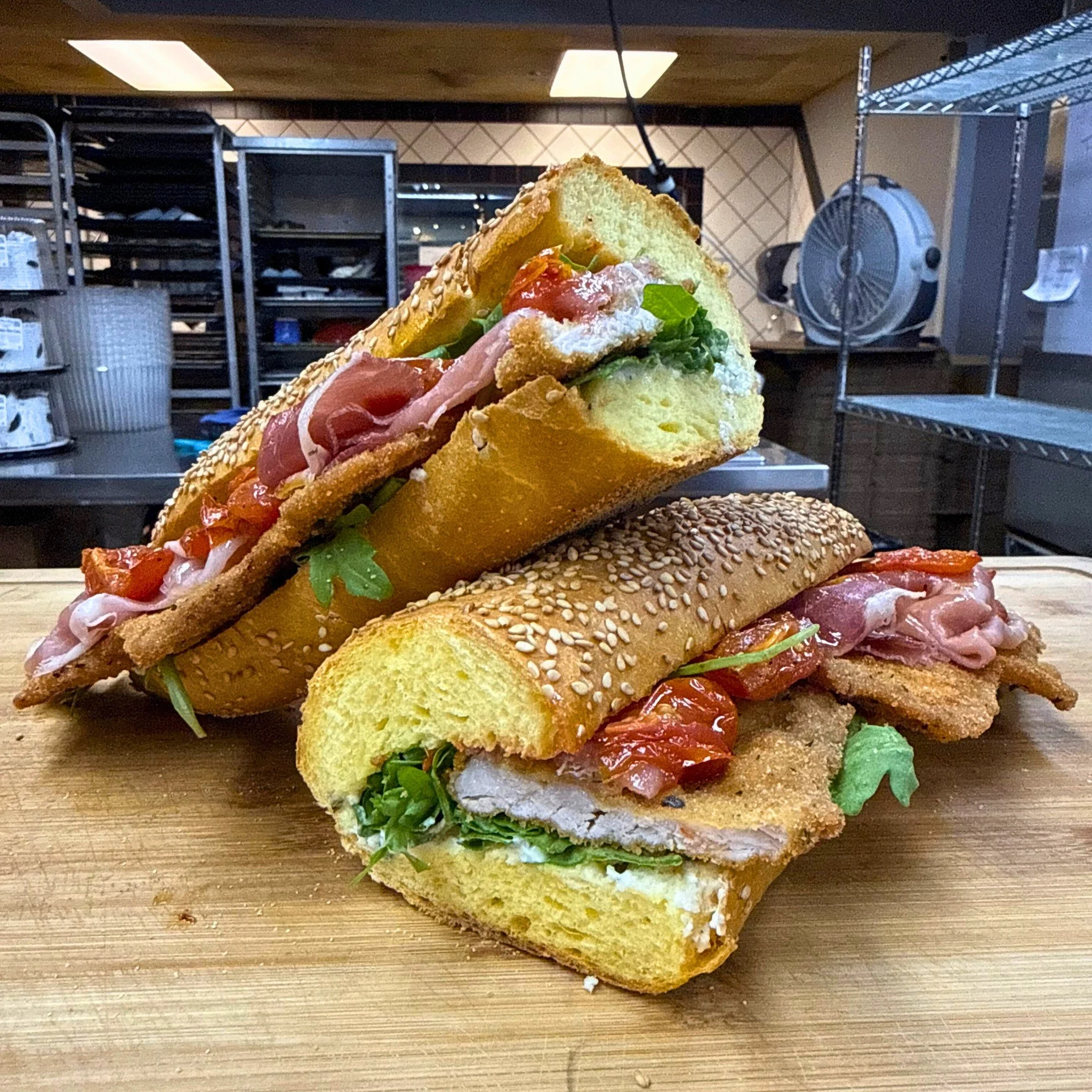 🚨SANDWICH SATURDAY🚨
Available Saturday, September 6th ONLY!
✨Il Gladiatore✨
A golden fried pork cutlet stacked on an artisanal semolina baguette, finished with creamy pecorino crema, fresh arugula, roasted cherry tomatoes, and thin slices of pros