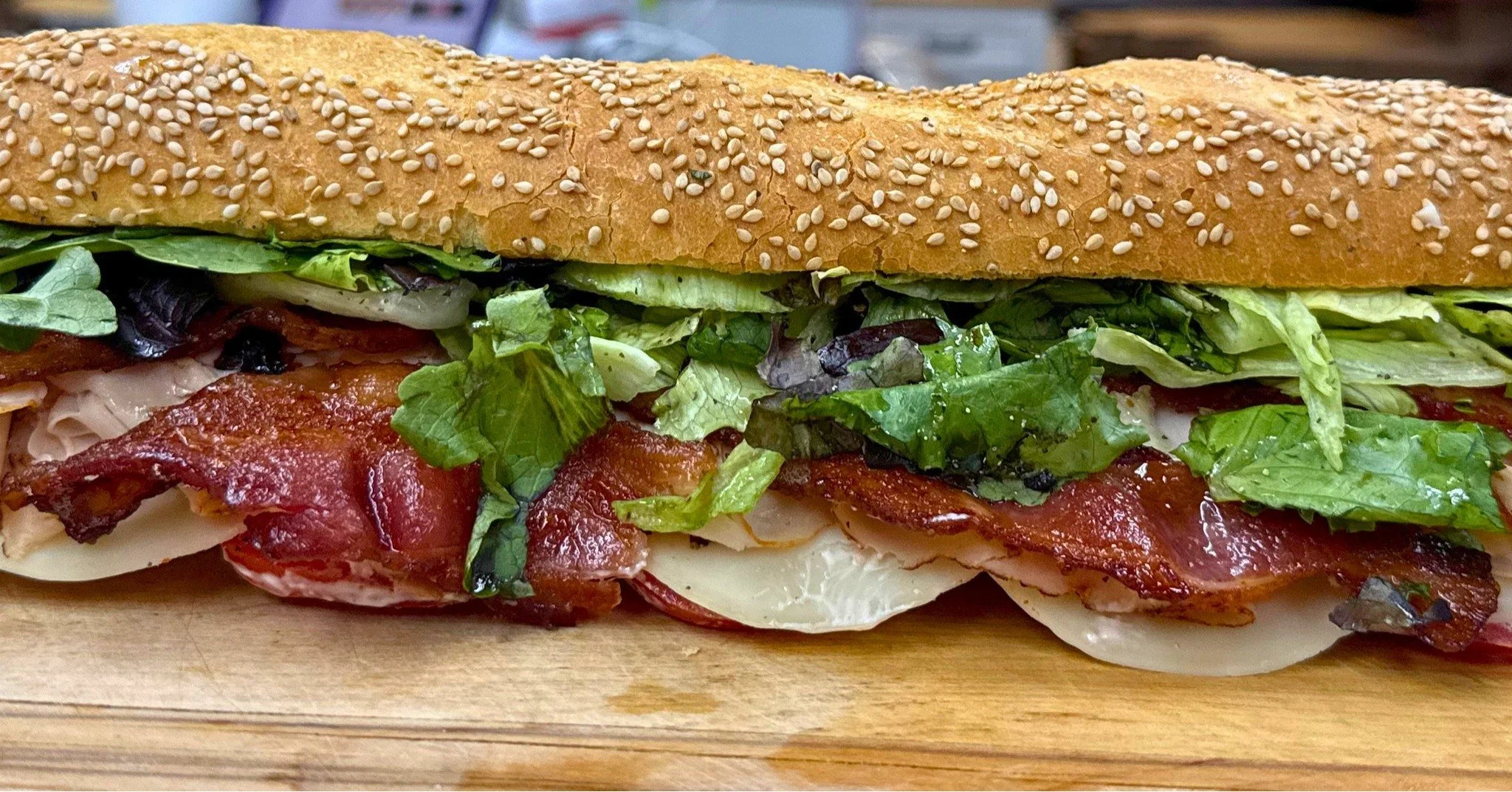 🥖🔥 The Hot Honey Club Sandwich 🔥🥖

This one is stacked on a semolina baguette with mayo, seasoned sliced tomatoes, smoky provolone, Cajun turkey, hot honey bacon, and mixed greens. Sweet, smoky, a little spicy, and seriously delicious.

Available