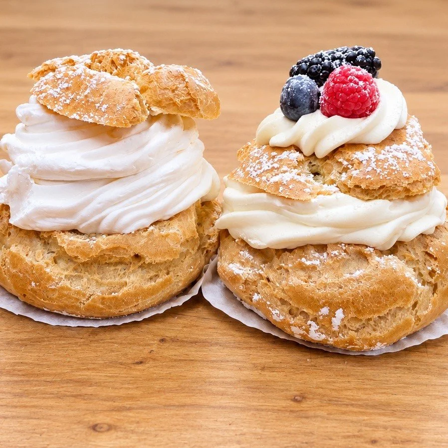 Two cream puffs, one delicious decision. 🤍🫐

Keep it classic with our regular cream puff, or go fruity with our Chantilly cream puff with mixed berries! Golden pastry, generous cream, and a dusting of powdered sugar&mdash;which one are you choosing